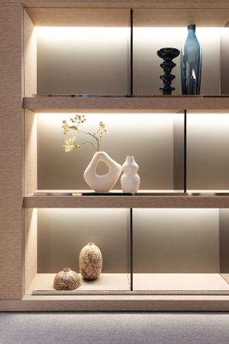 Modern shelving with decorative vases and lighting, Lagoon SIXTY 5, 2025 model.