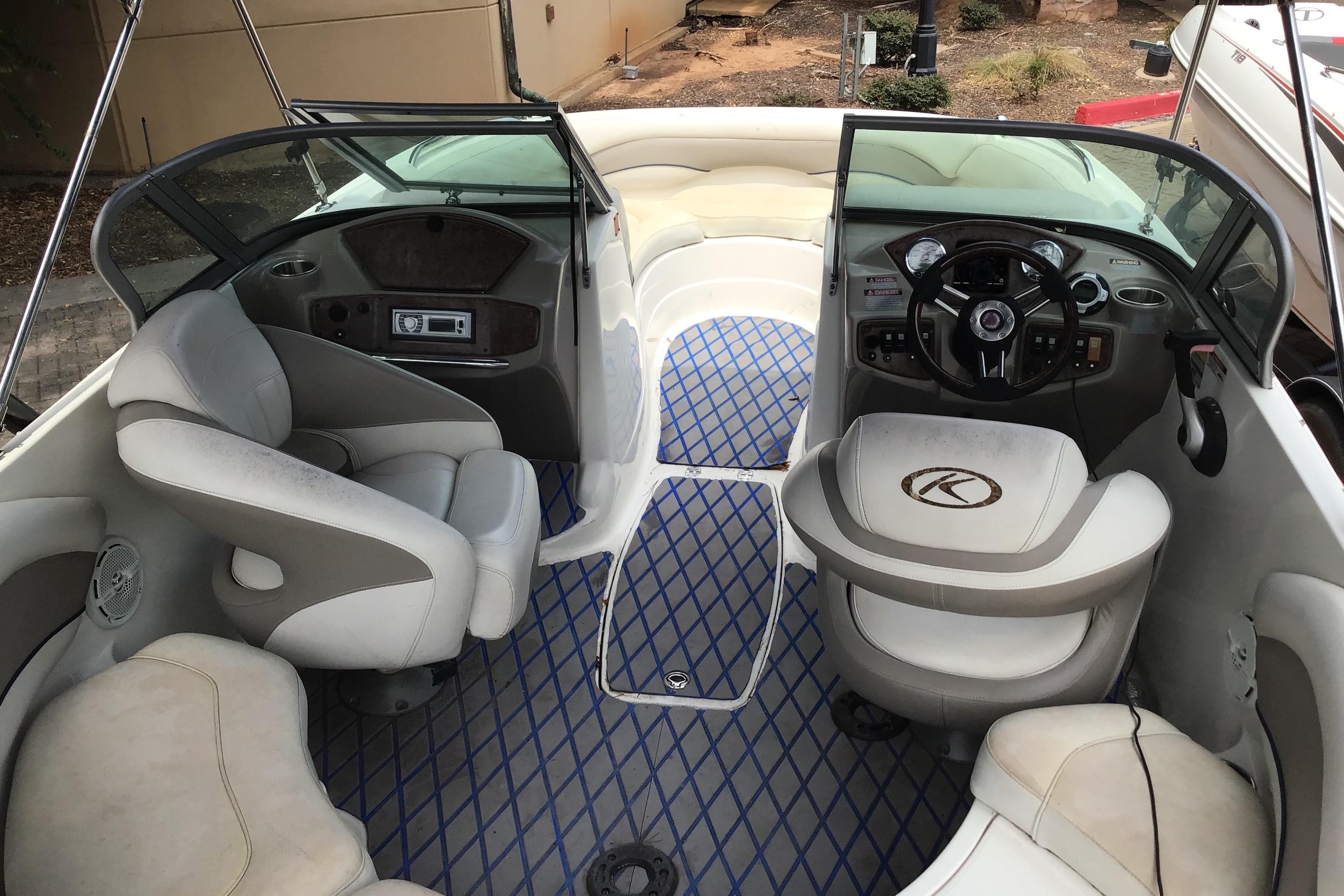 2008 Harris-Kayot V200i boat interior with seating and steering wheel.