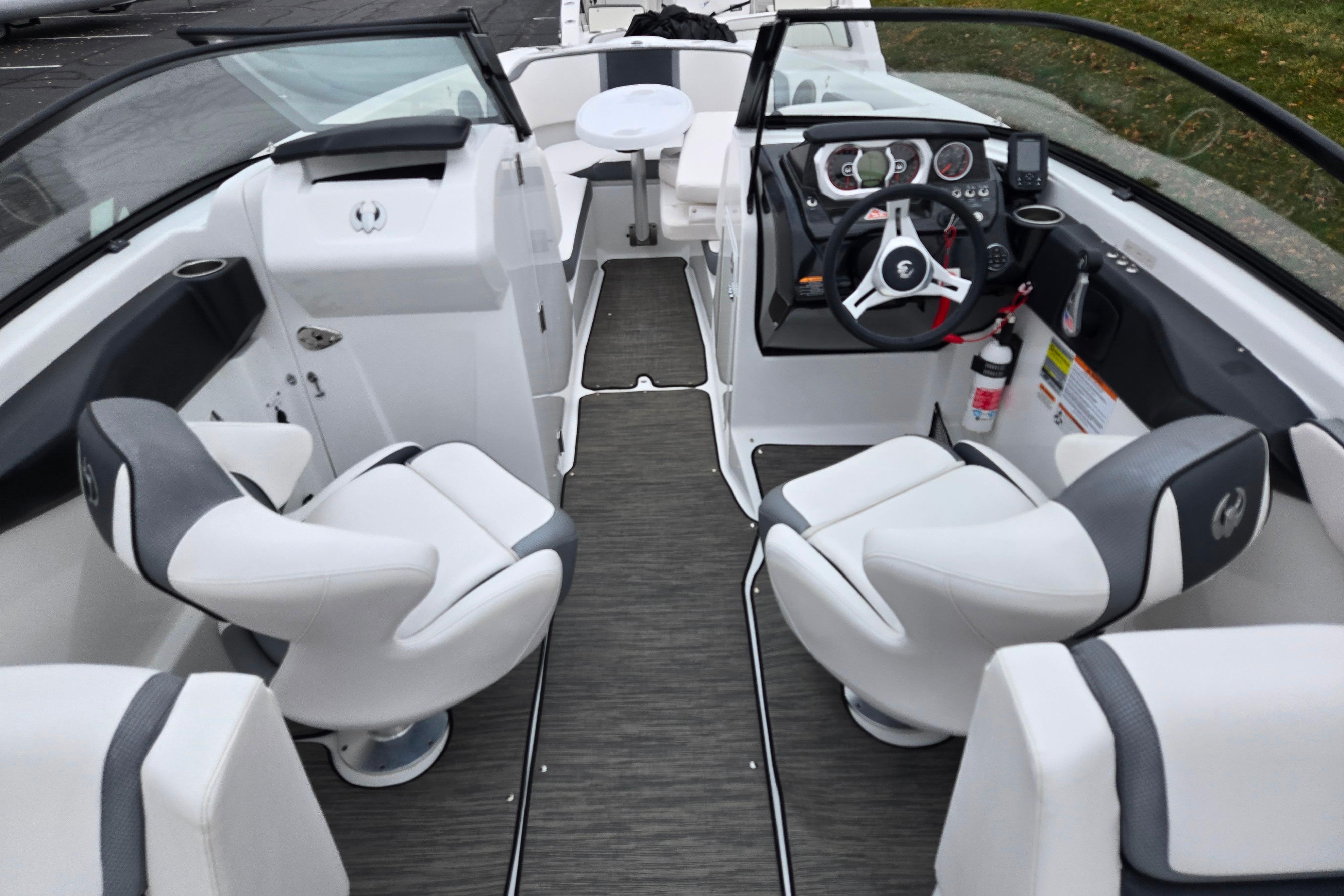 2021 Scarab 255 ID boat interior with modern seating and steering console.