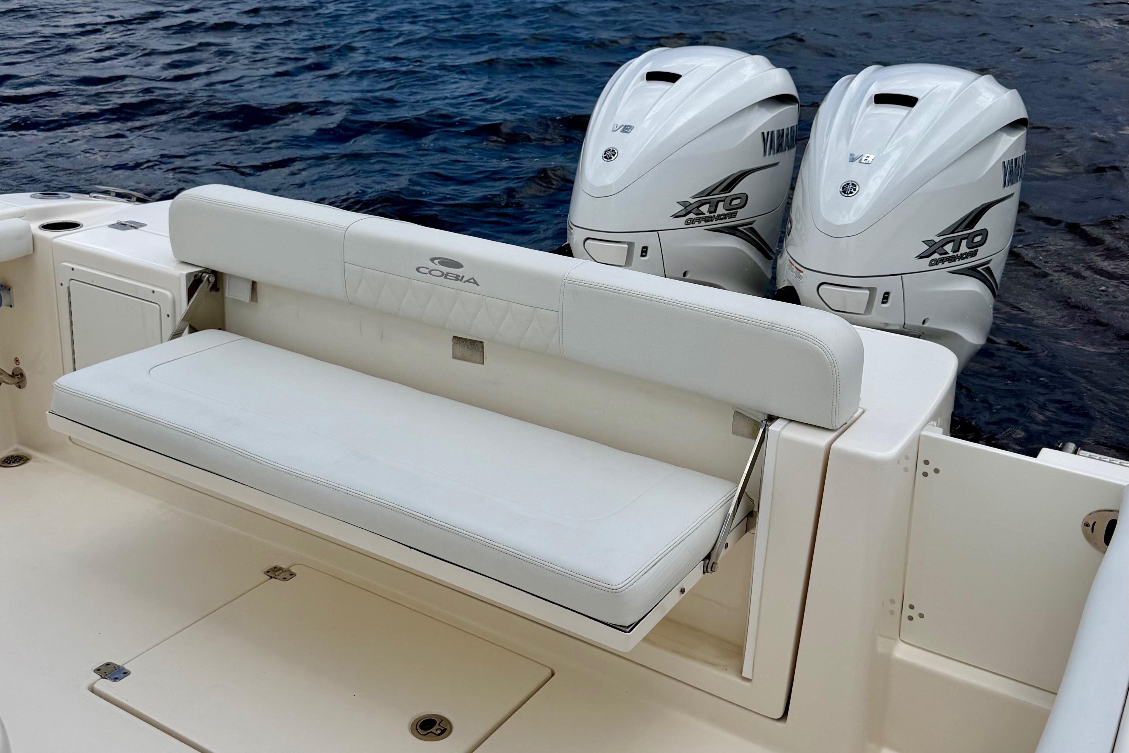 2023 Cobia 350 Center Console boat with Yamaha XTO engines on water.