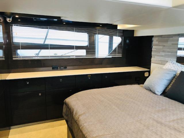 Interior of 2019 Cruisers Yachts 50 Cantius with modern bedroom design.