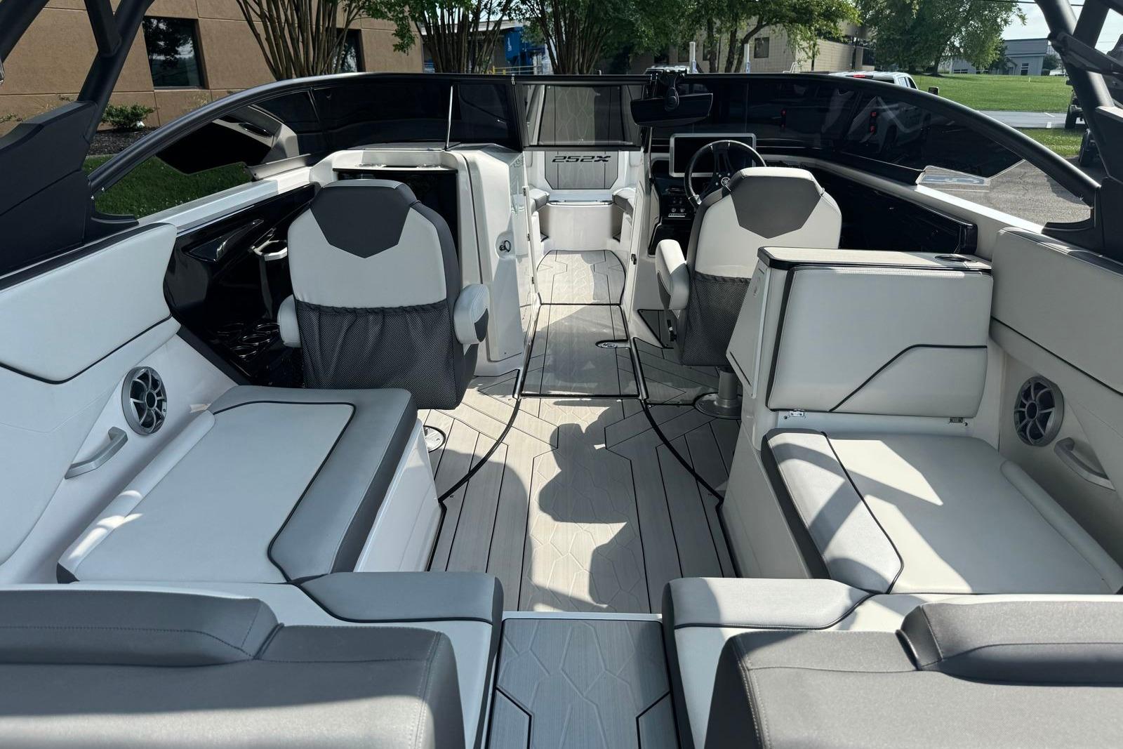 2023 Yamaha Boats 252XE interior with sleek seating and modern design features.