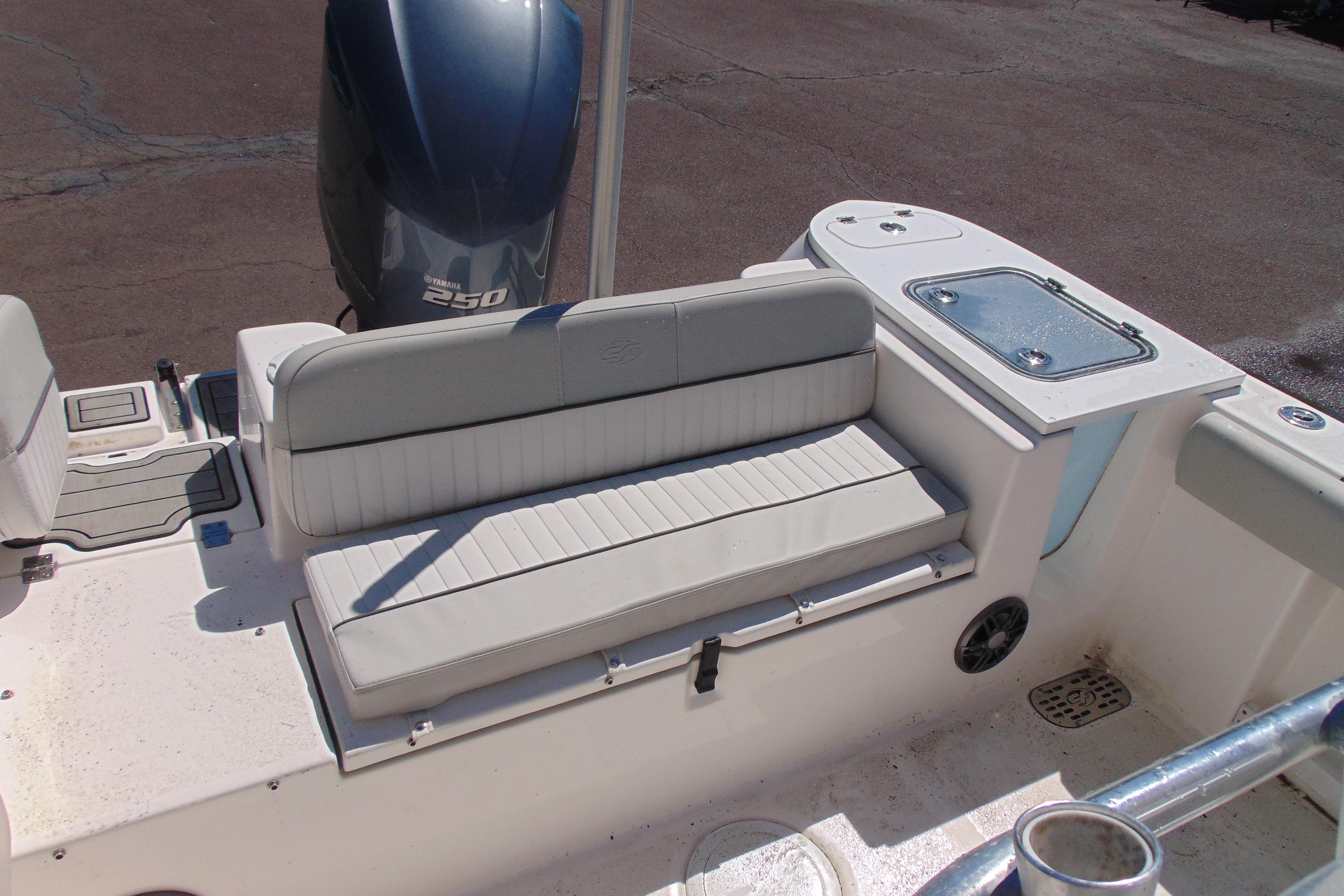 2022 Sea Fox 248 Commander boat interior with seating and Yamaha 250 engine.