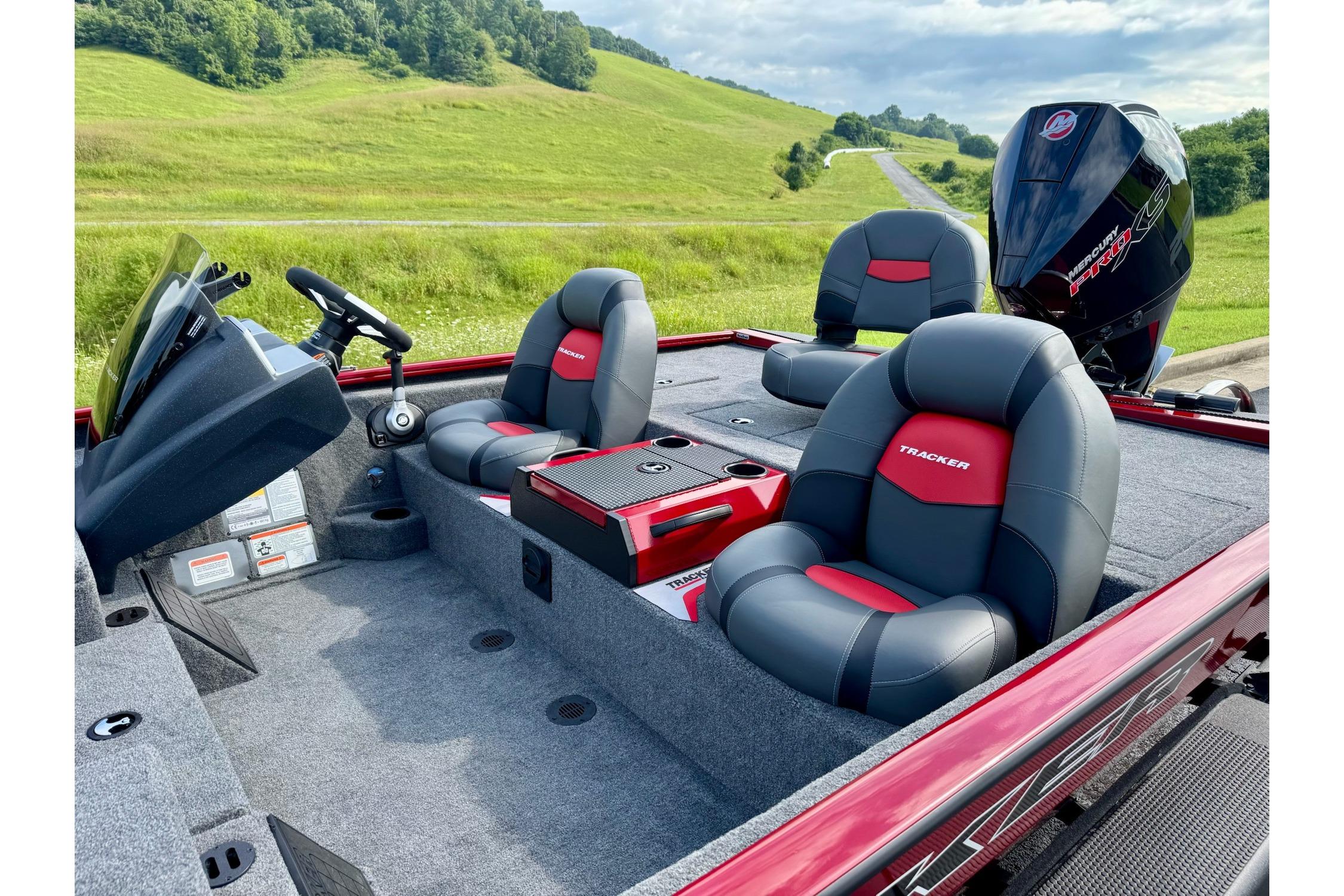 2026 Tracker Savage 215 boat interior with plush seating and modern dashboard.