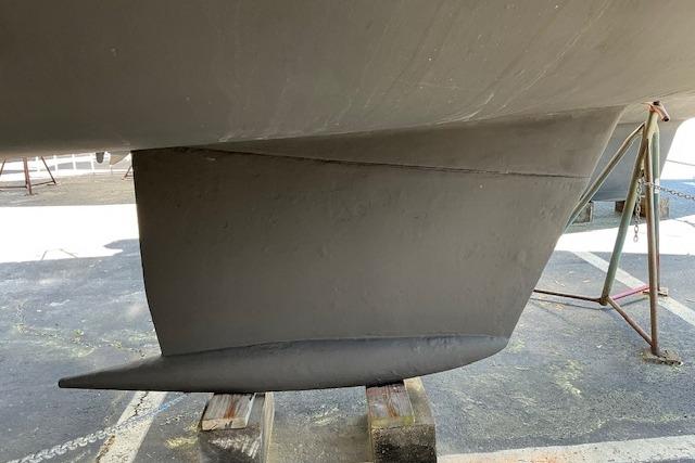 Keel of a 2000 Beneteau Oceanis 321 sailboat on a stand.