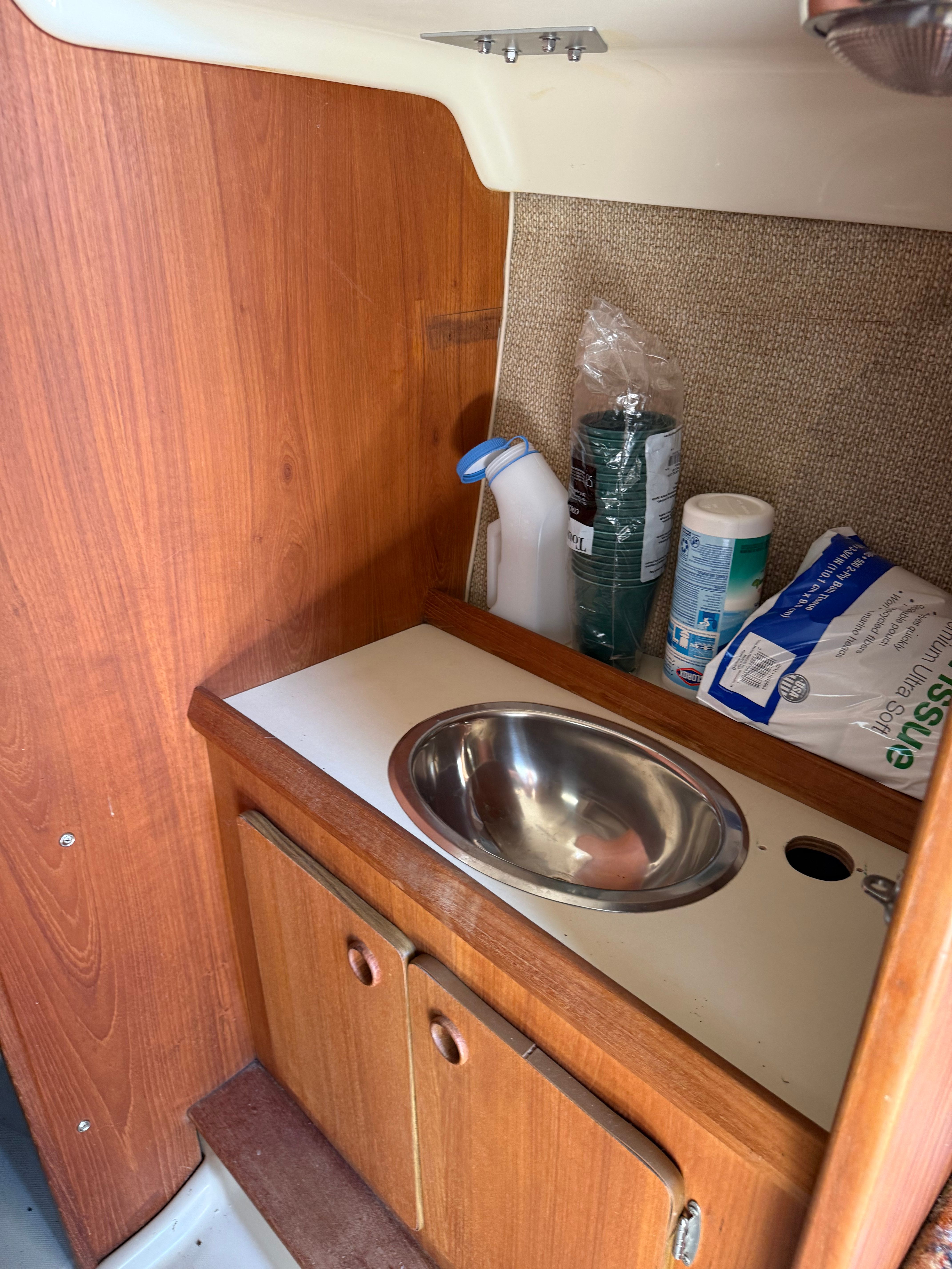 Interior of a 1984 O'Day 25 yacht with sink.