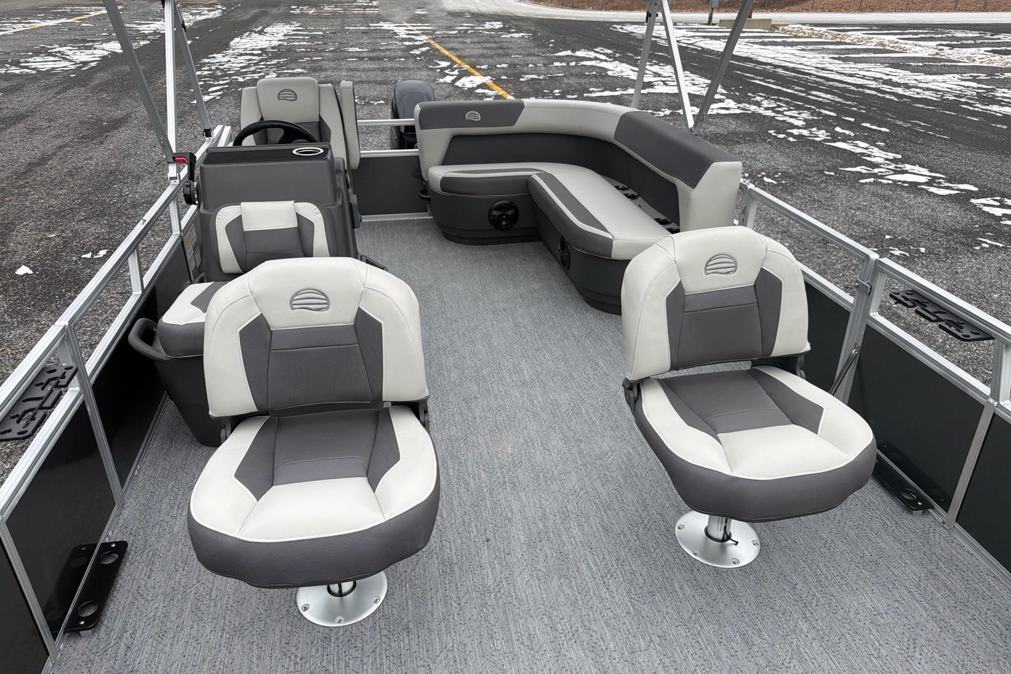2026 Sun Tracker Bass Buggy 16 XL Select pontoon boat interior with gray seating.