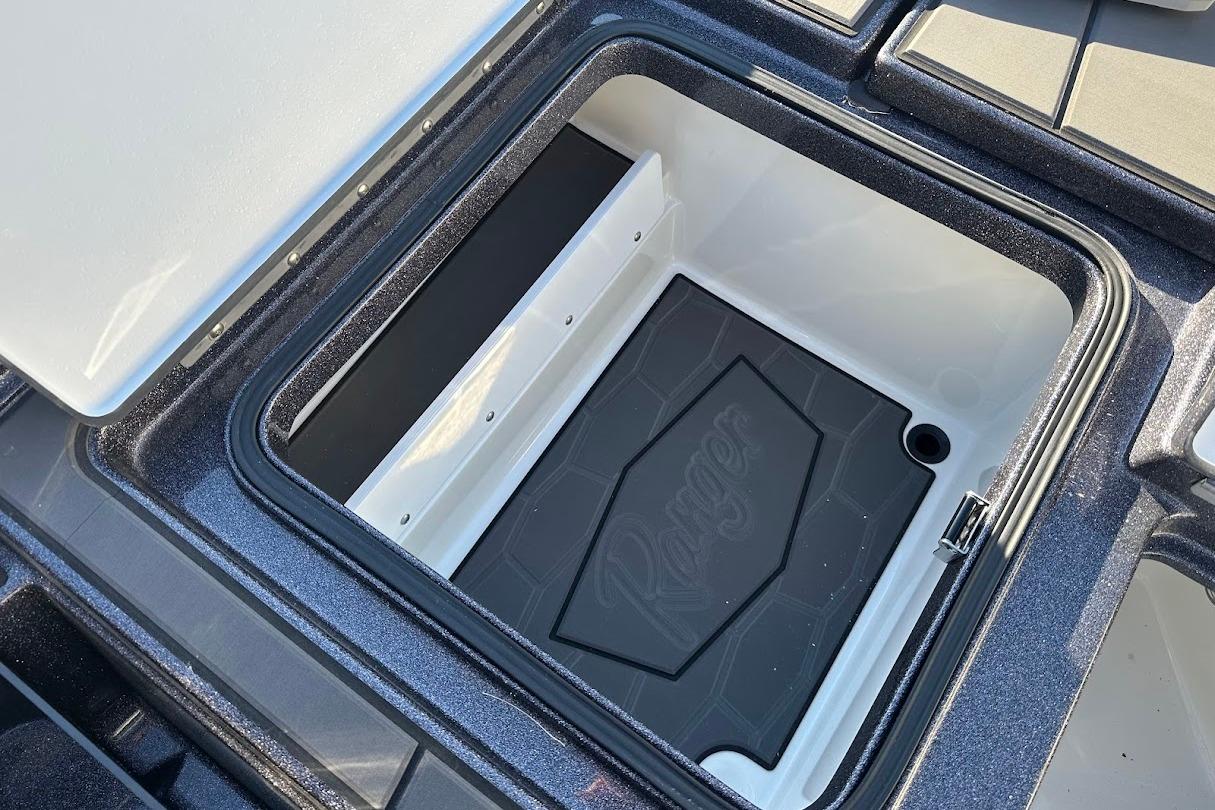 Open storage compartment in 2026 Ranger Z521R Garmin Cup-Equipped boat.