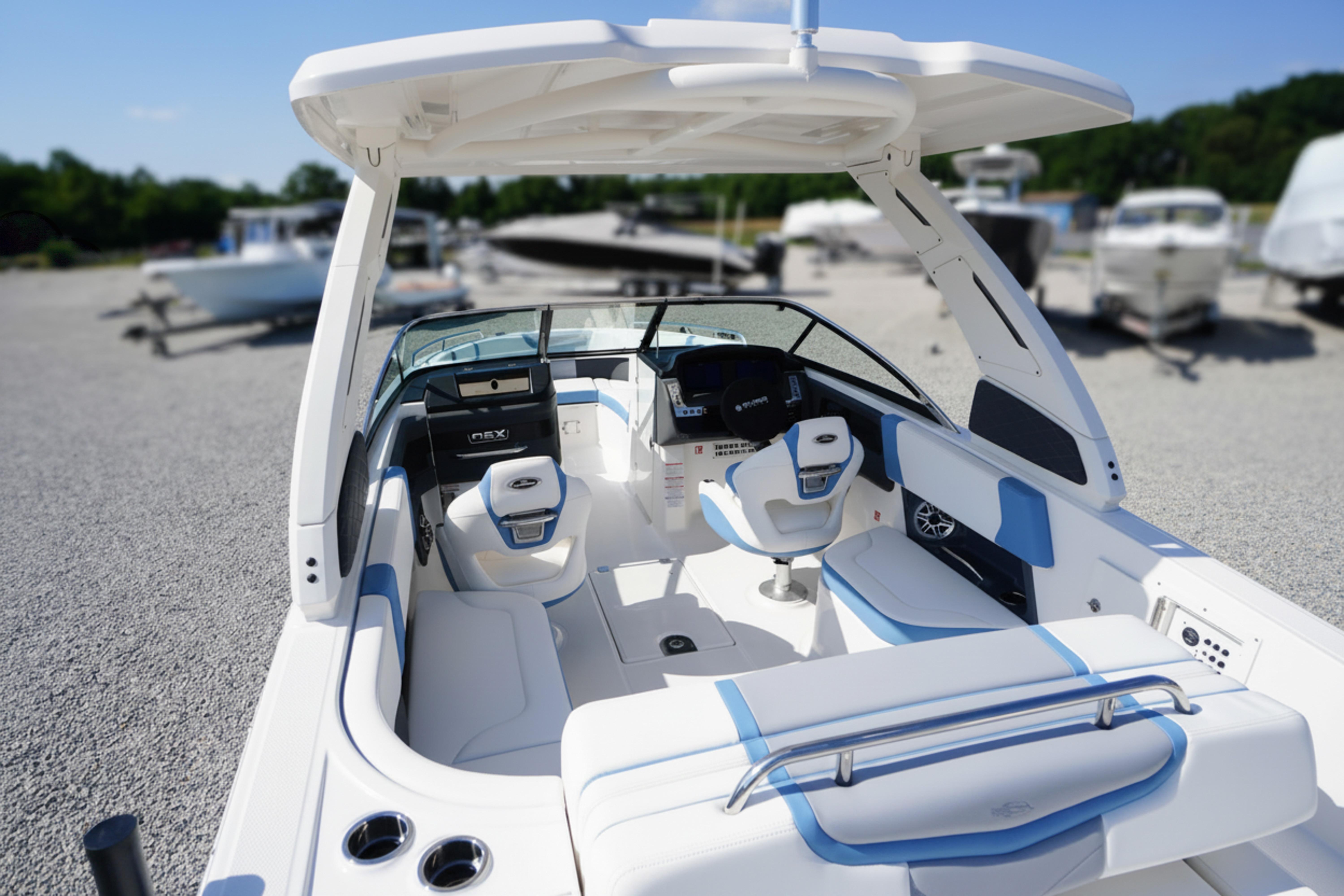2026 Chaparral 270 OSX boat interior with modern seating and sleek design.
