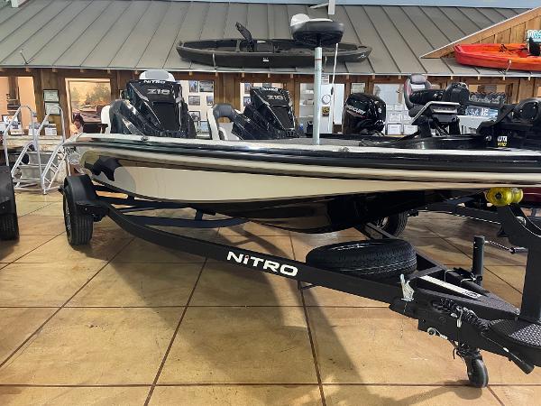 2025 Nitro Z18 Pro boat displayed in showroom with trailer.