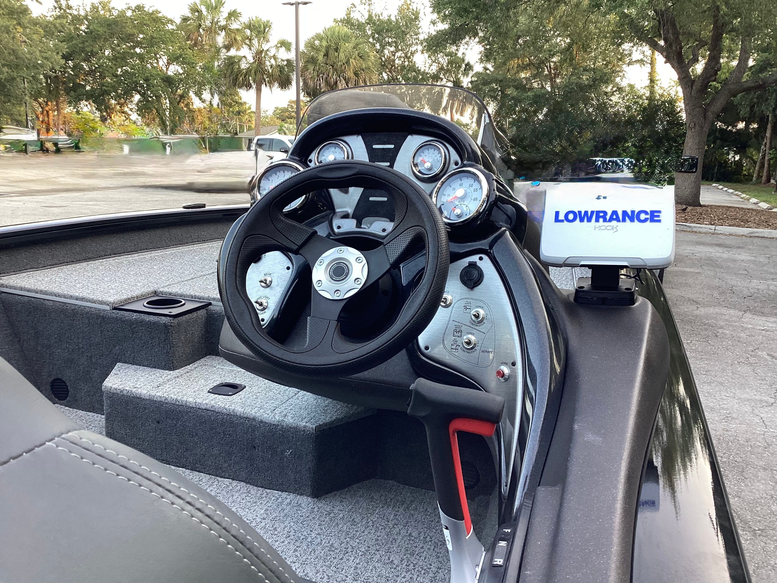 Tracker PRO 2023 boat dashboard with Lowrance GPS system.