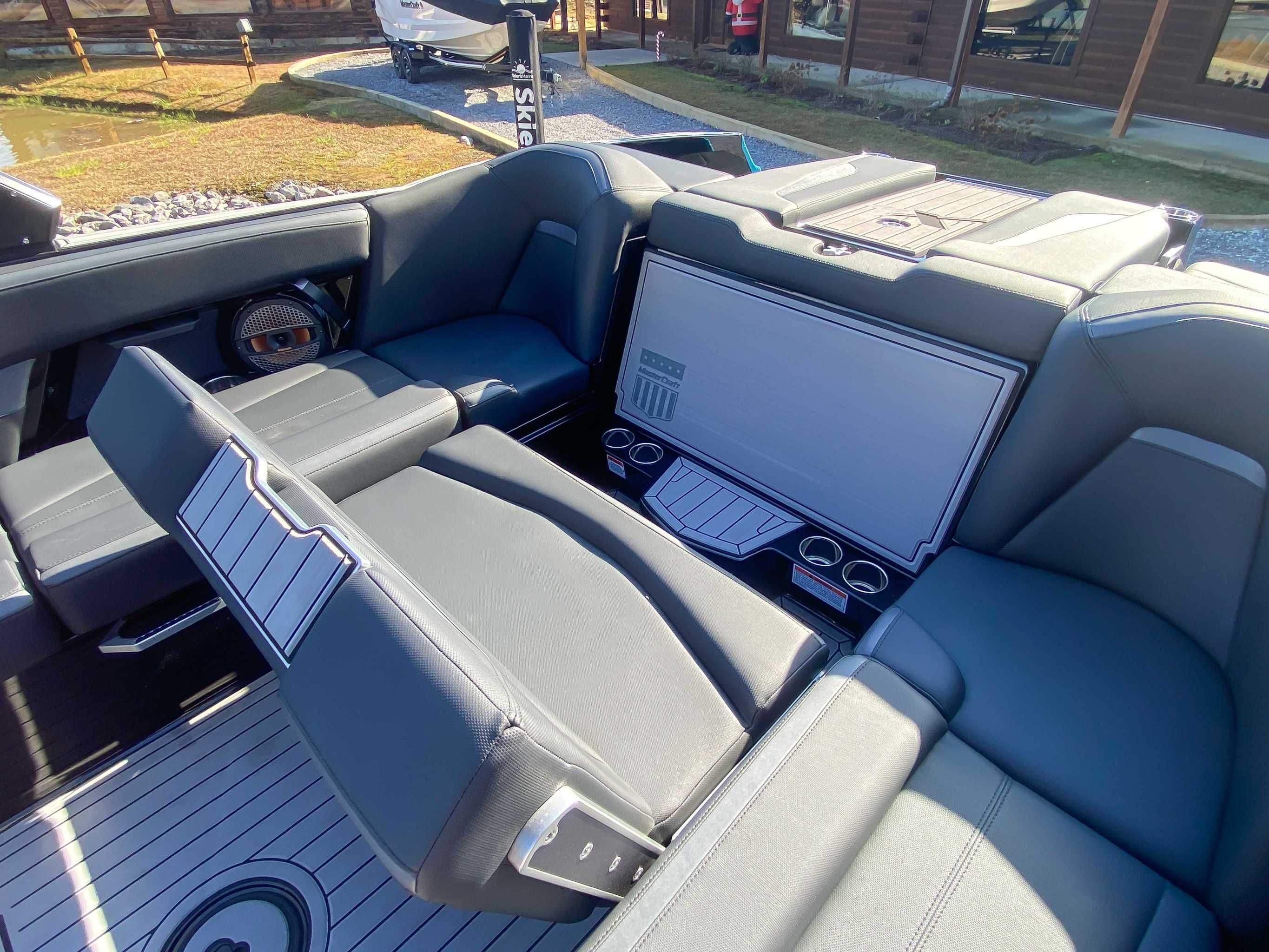 Interior of 2024 MasterCraft XStarS boat with luxurious seating.