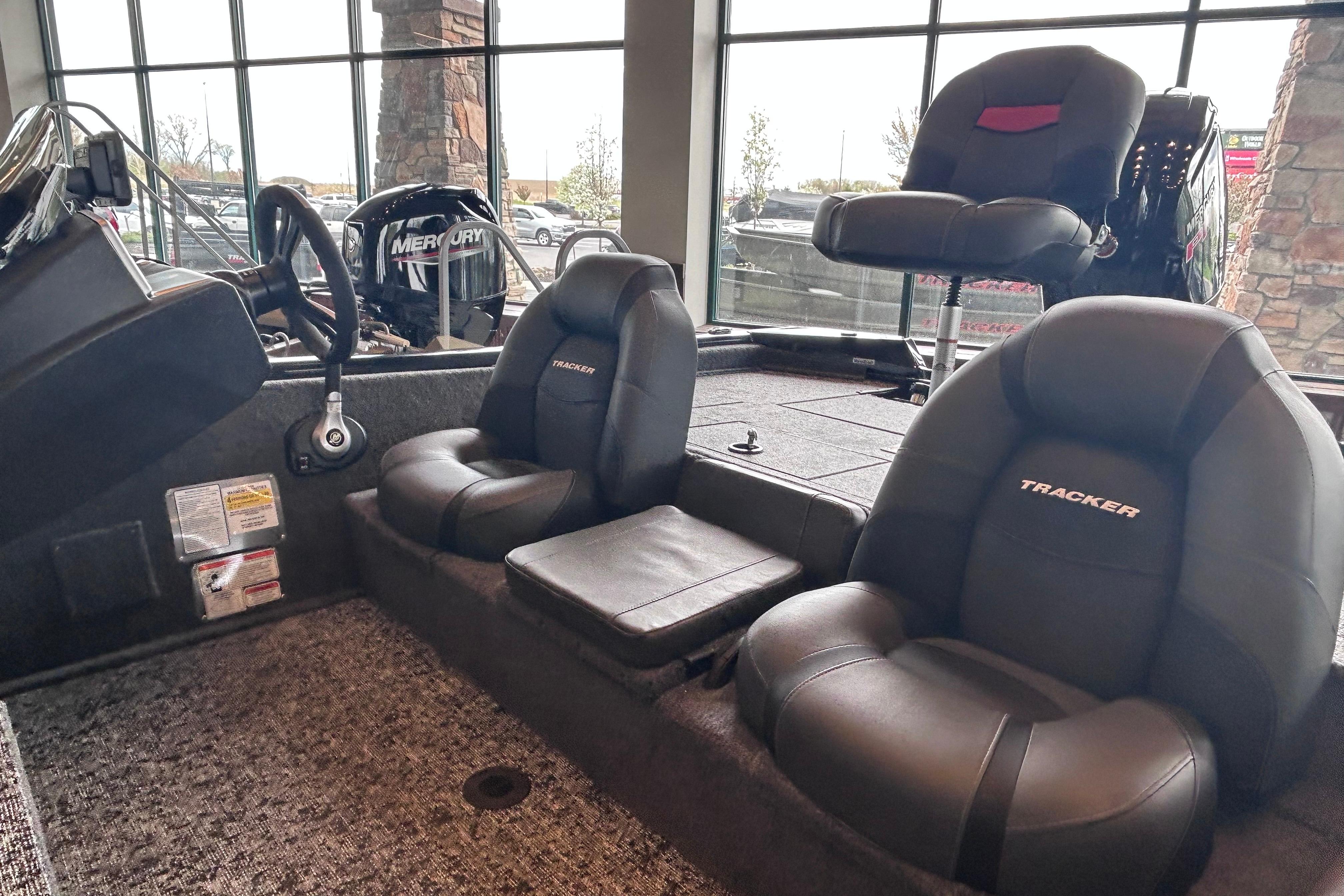2026 Tracker Pro Team 195 boat interior with comfortable seating and Mercury engine.