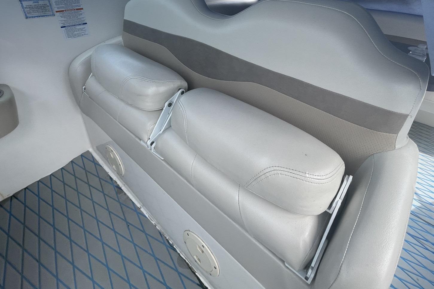 2005 Chaparral 290 Signature boat interior seating with gray upholstery.