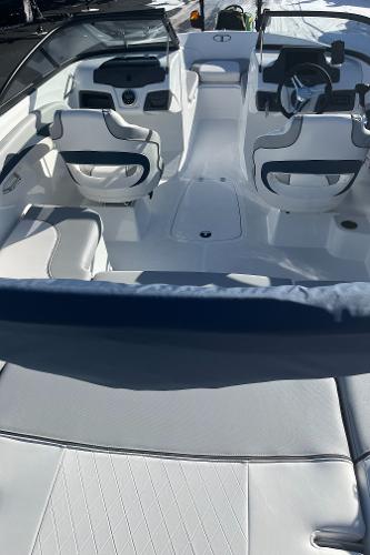 2024 Tahoe 210 Si boat interior with white and blue seating.