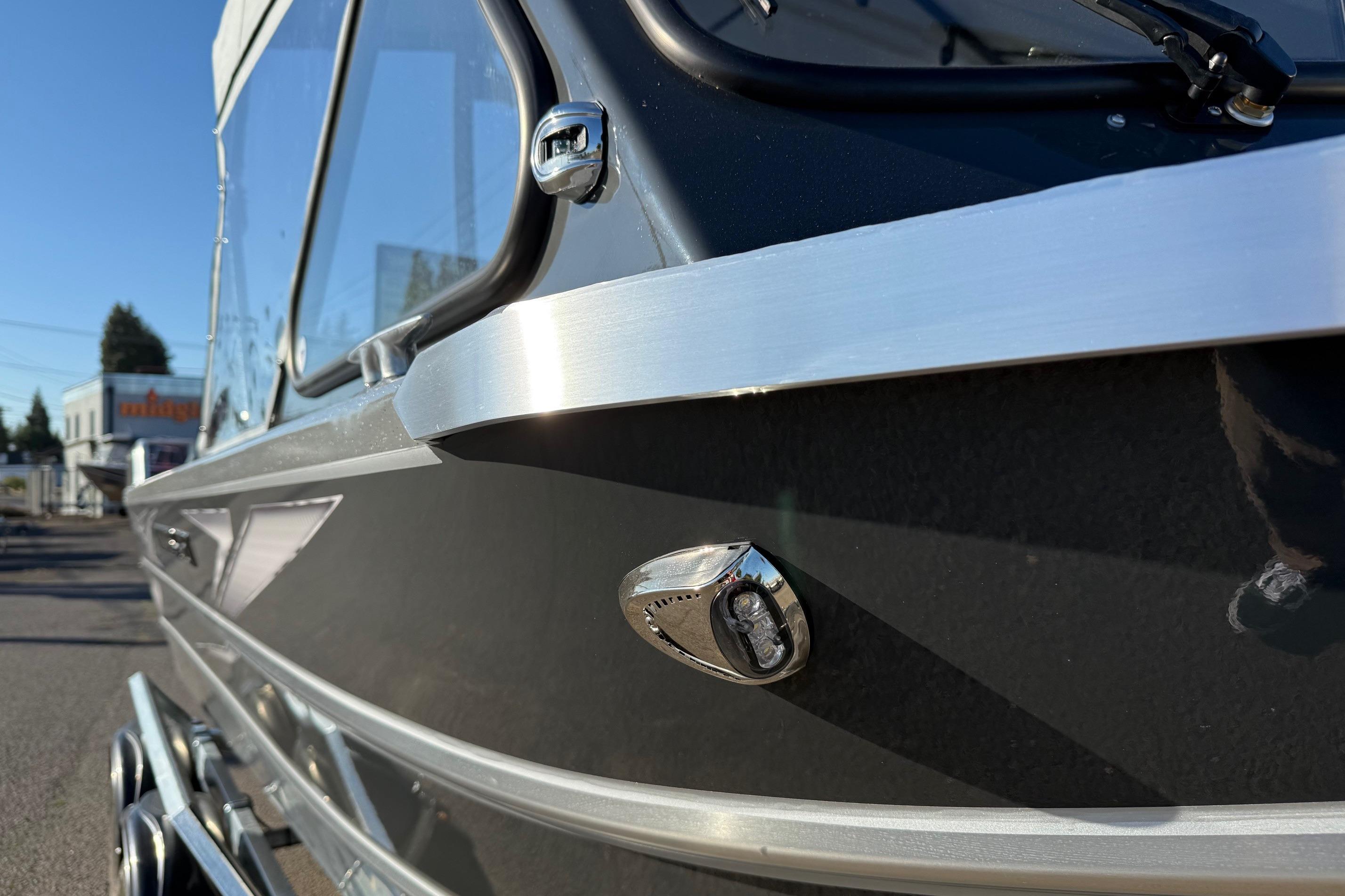 2026 Thunder Jet 200 Luxor boat, sleek black exterior with chrome detailing.