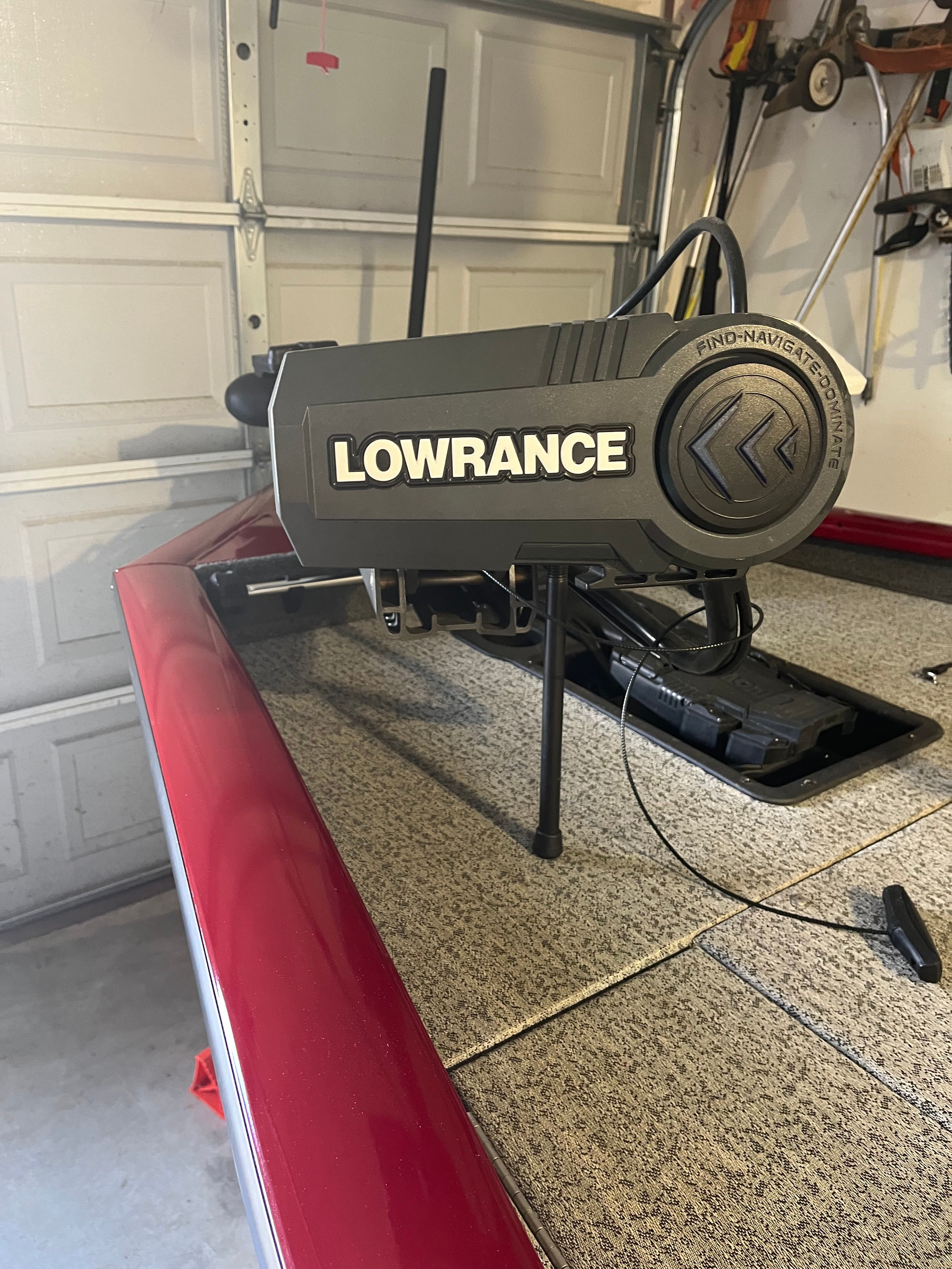 A Lowrance fish finder is mounted on a Bass Tracker PRO 175 TEAM TXW Tournament Edition boat.