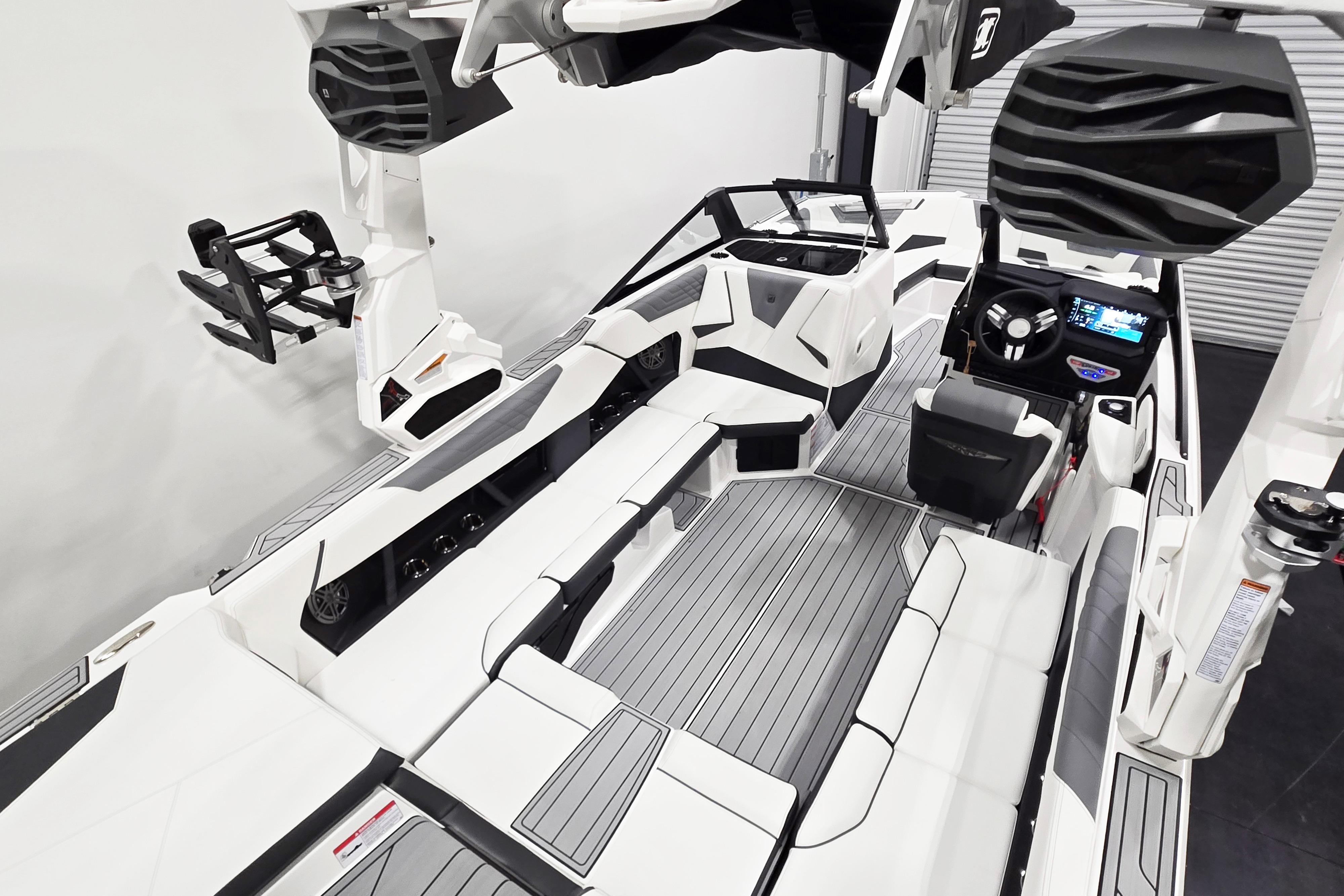 2026 Nautique Super Air Nautique S23 interior with sleek seating and advanced dashboard.