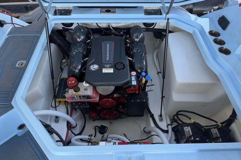 Engine compartment of a 2026 Cobalt R8 Surf boat, showcasing Volvo Penta engine.