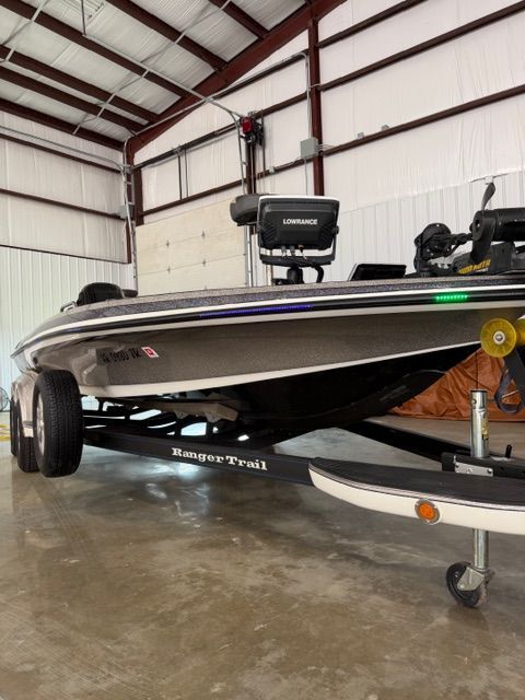 2011 Ranger Z520 Comanche boat in warehouse on trailer.