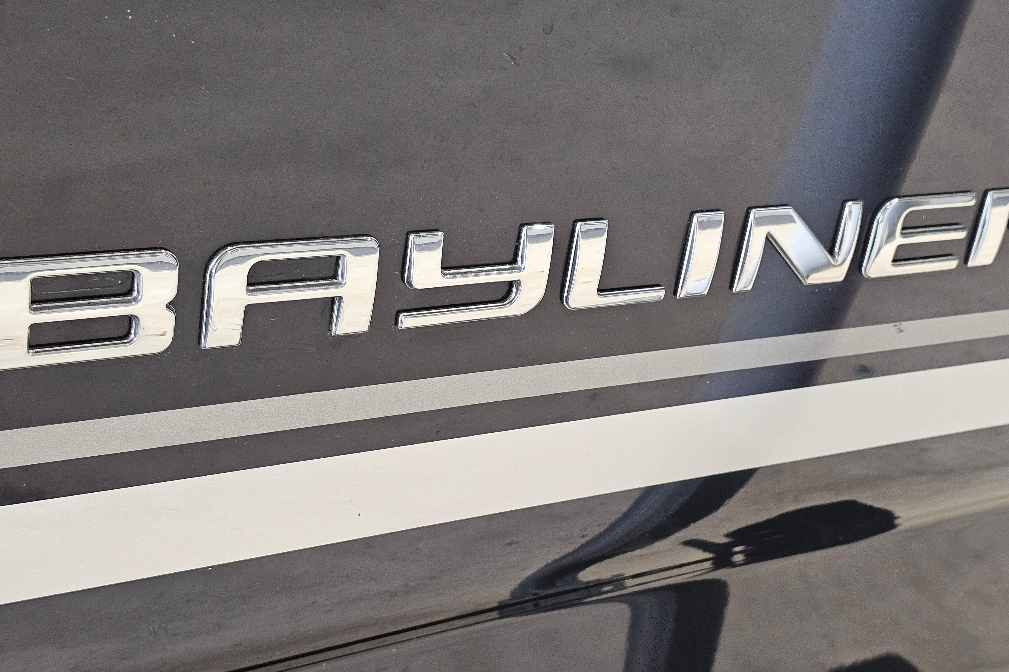 Bayliner 170 Bowrider 2019 logo on sleek black surface.