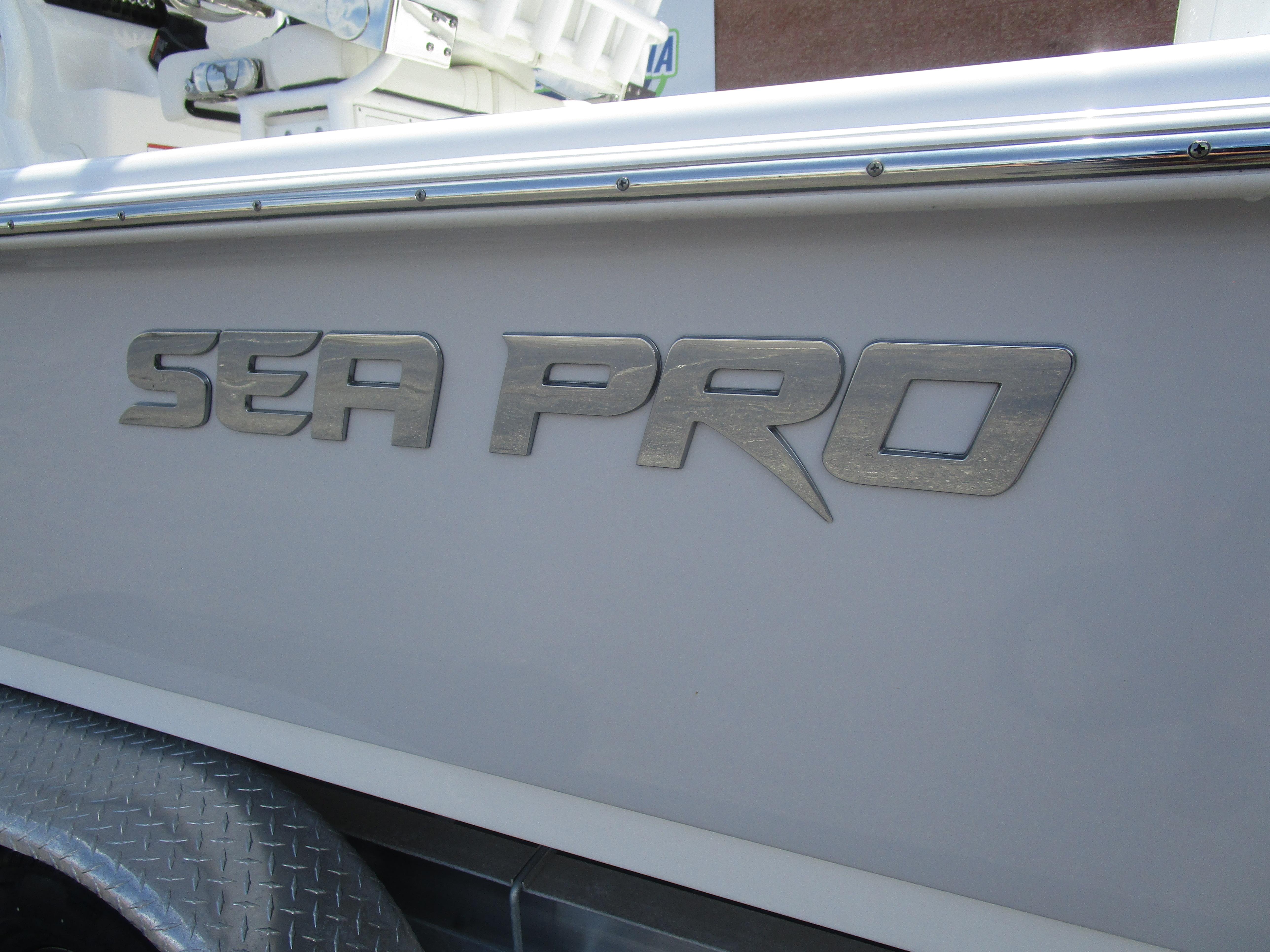 2025 Sea Pro 230 DLX BAY boat logo on side panel.