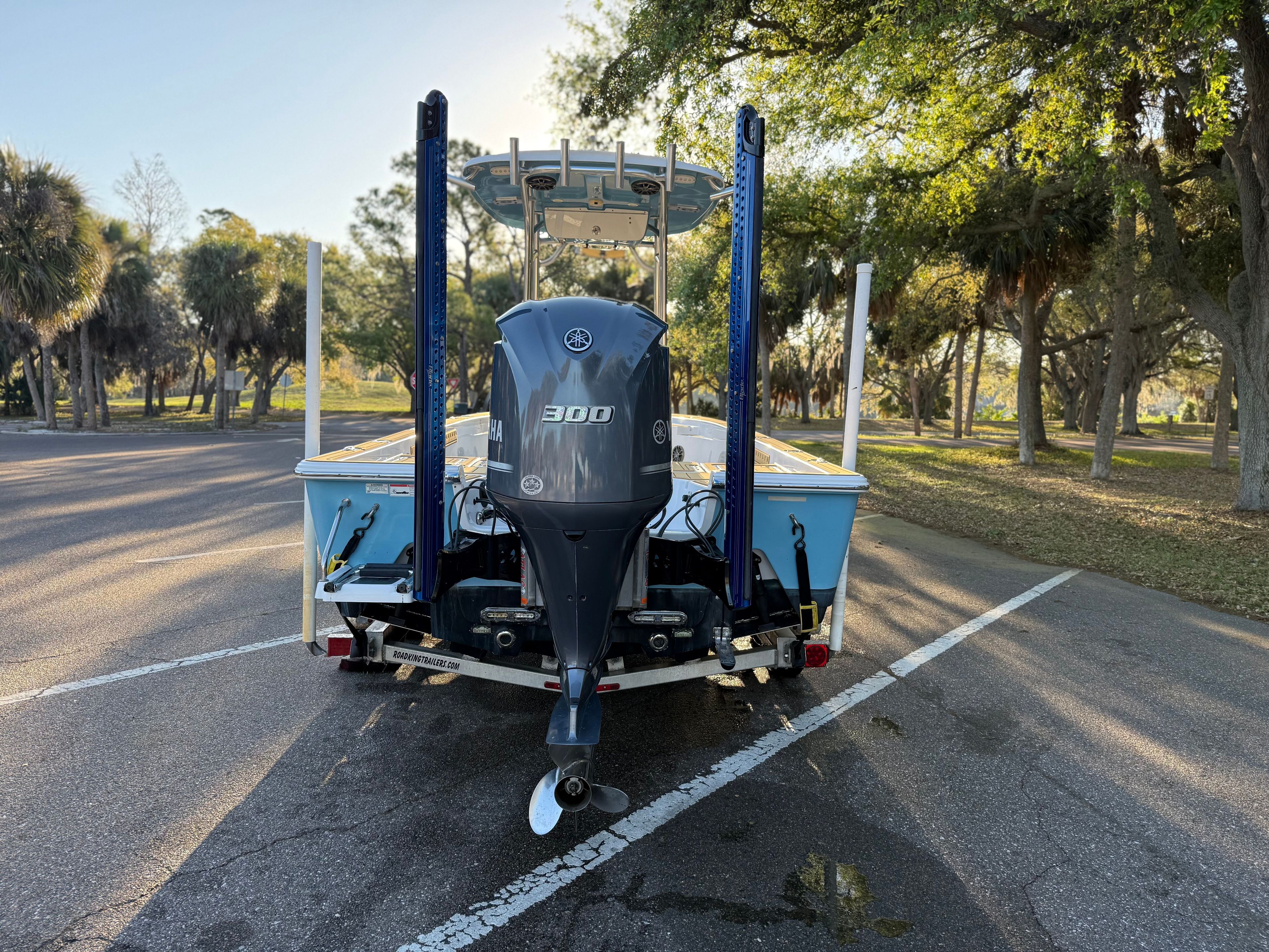 2016 Sportsman Masters 247 Bay Boat with Yamaha 300 engine in park.