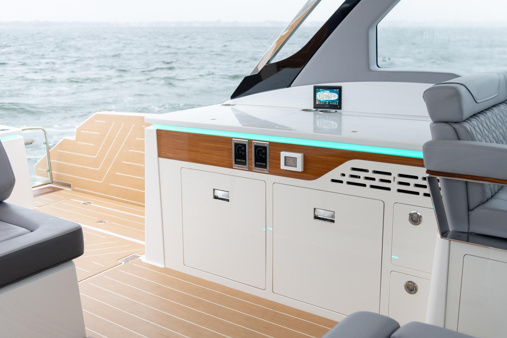 Luxurious 2026 Regal LX43 yacht interior with modern seating and sleek design.