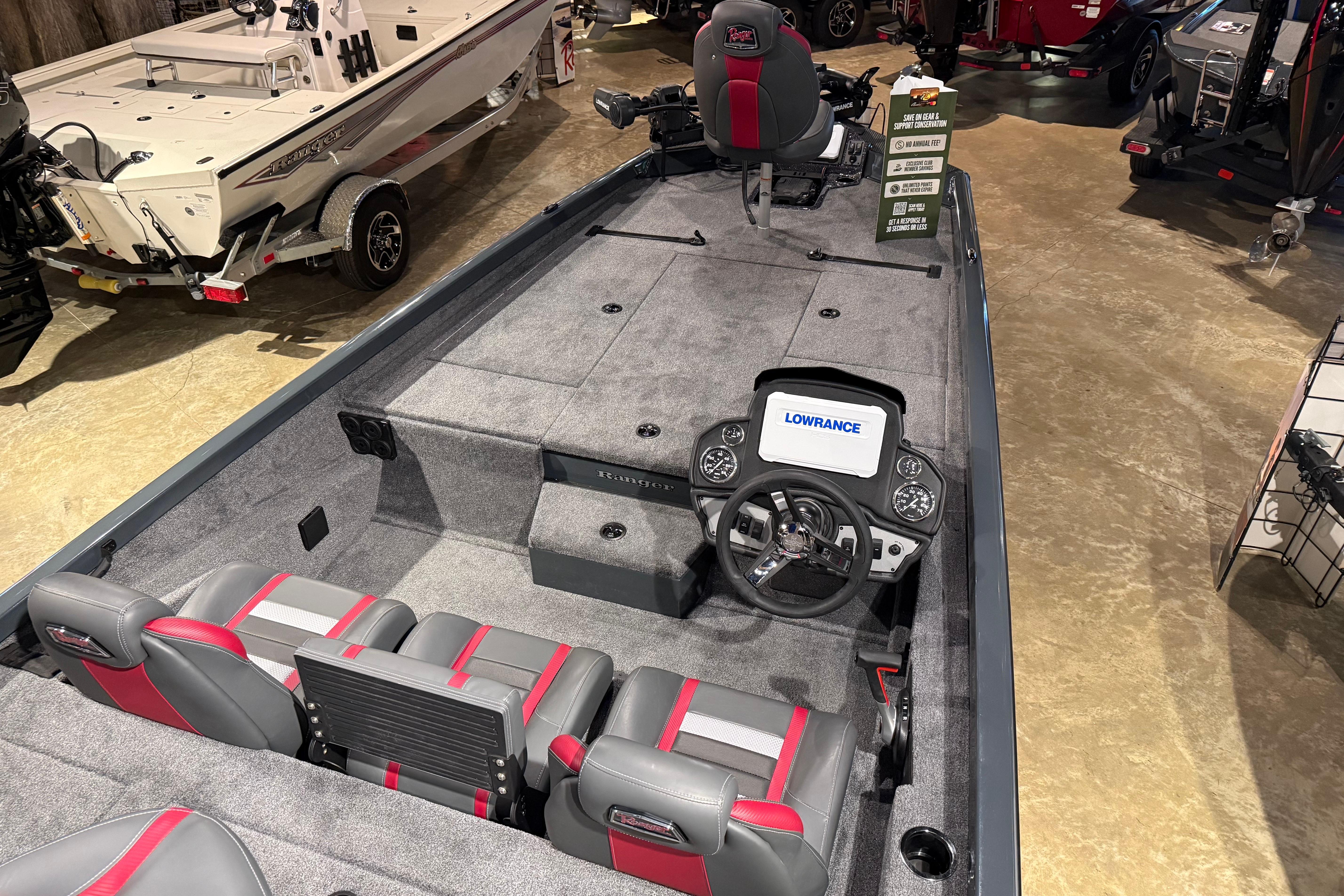 2026 Ranger RT198P boat interior with Lowrance electronics, gray and red seating, and steering console.