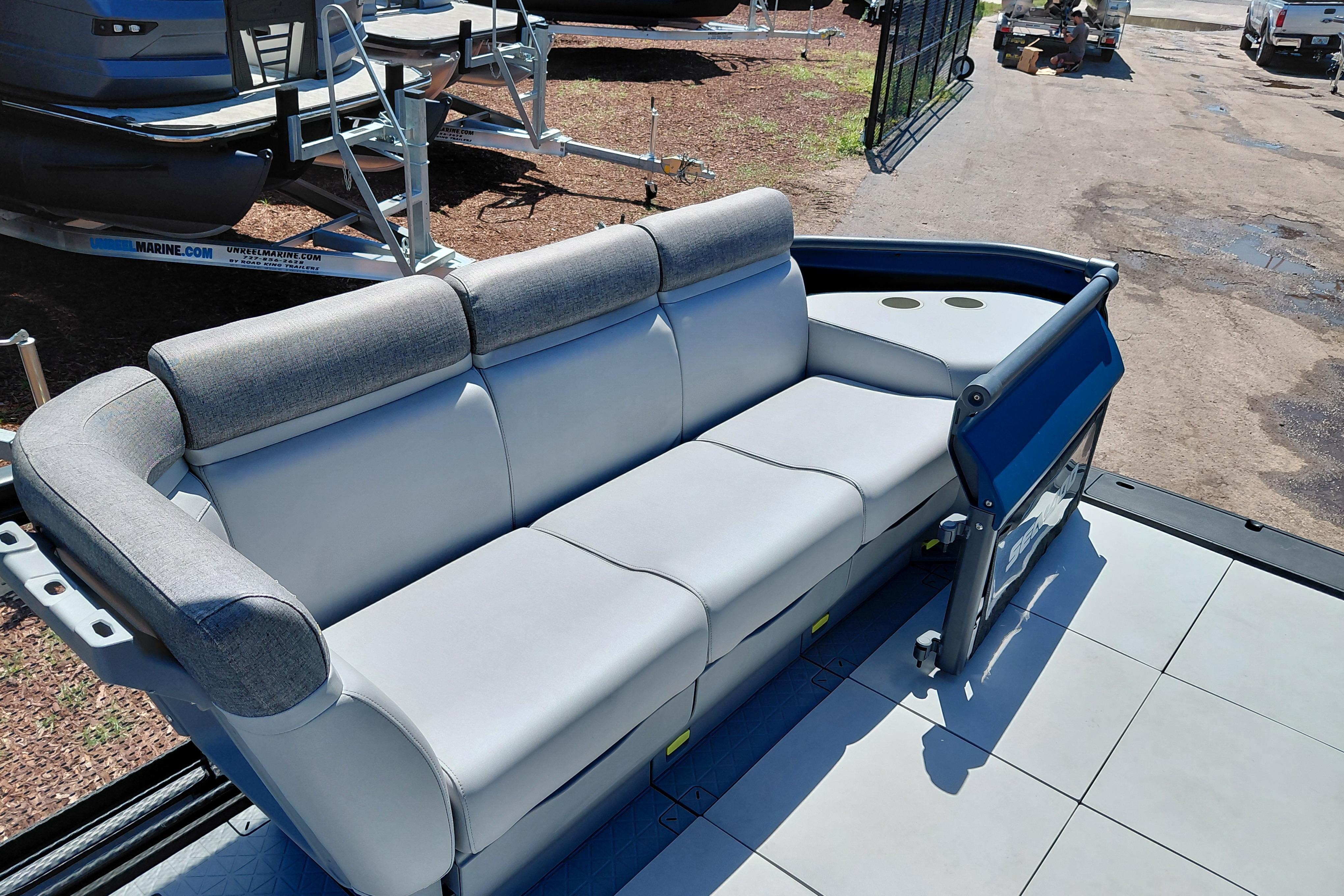 2024 Sea-Doo Switch Cruise 18 boat interior with comfortable seating and cup holders.