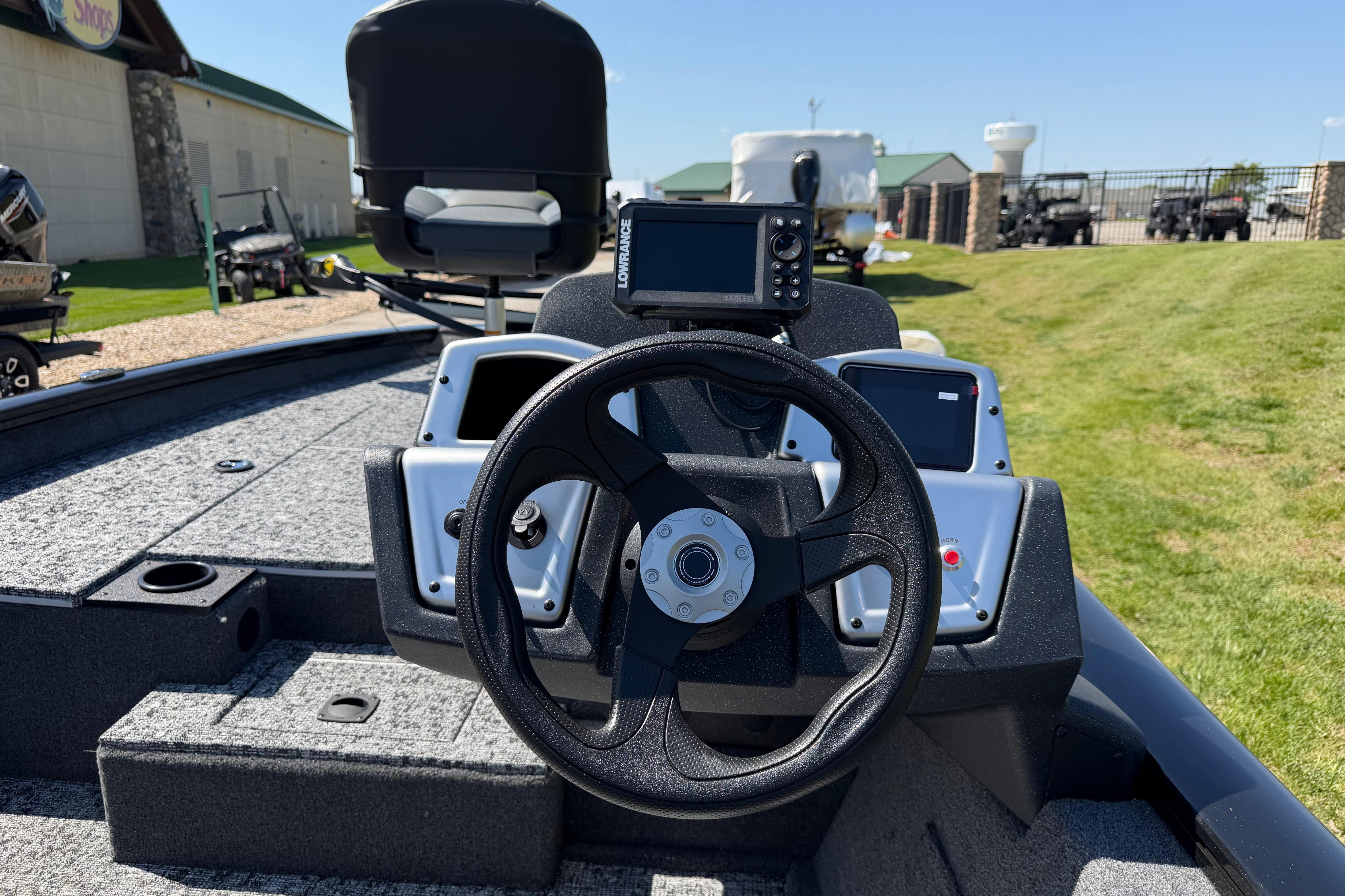 Steering console of 2026 Tracker Pro Team 175 boat with navigation system.