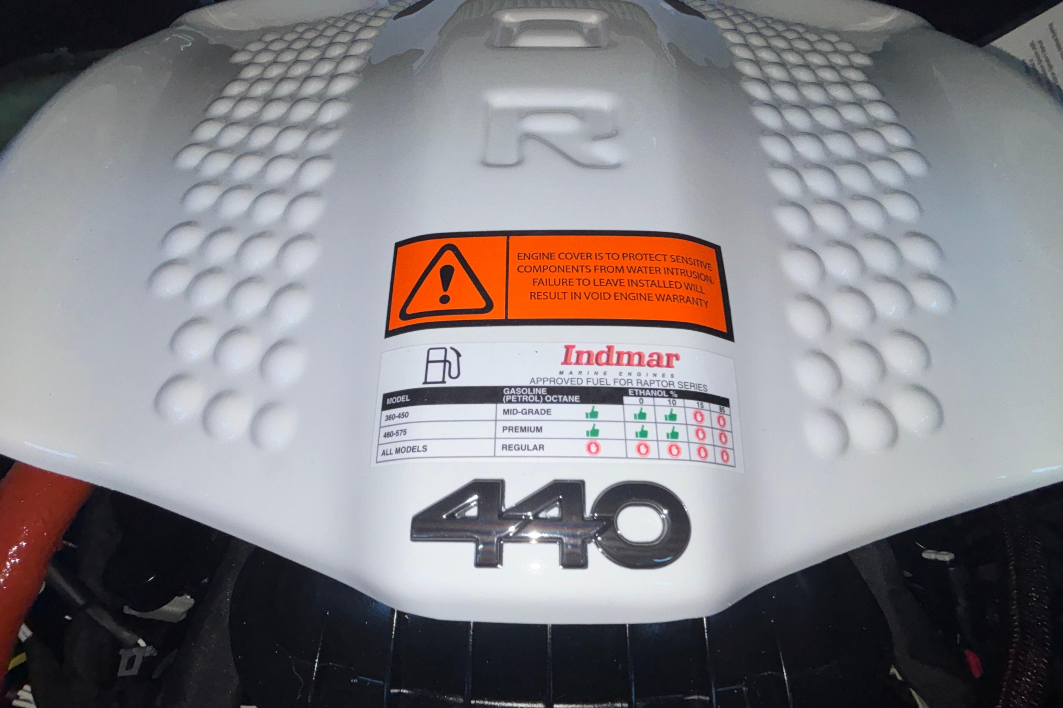 Engine cover of 2026 Tigé 24RZX with Indmar 440, fuel guidelines displayed.