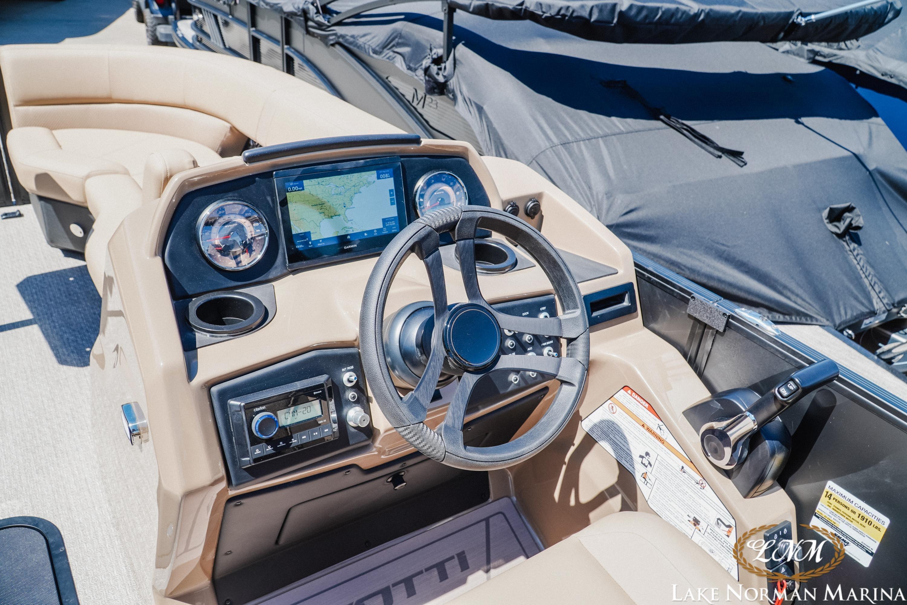Cockpit of 2026 Evotti 523CS boat with modern navigation system and controls at Lake Norman Marina.