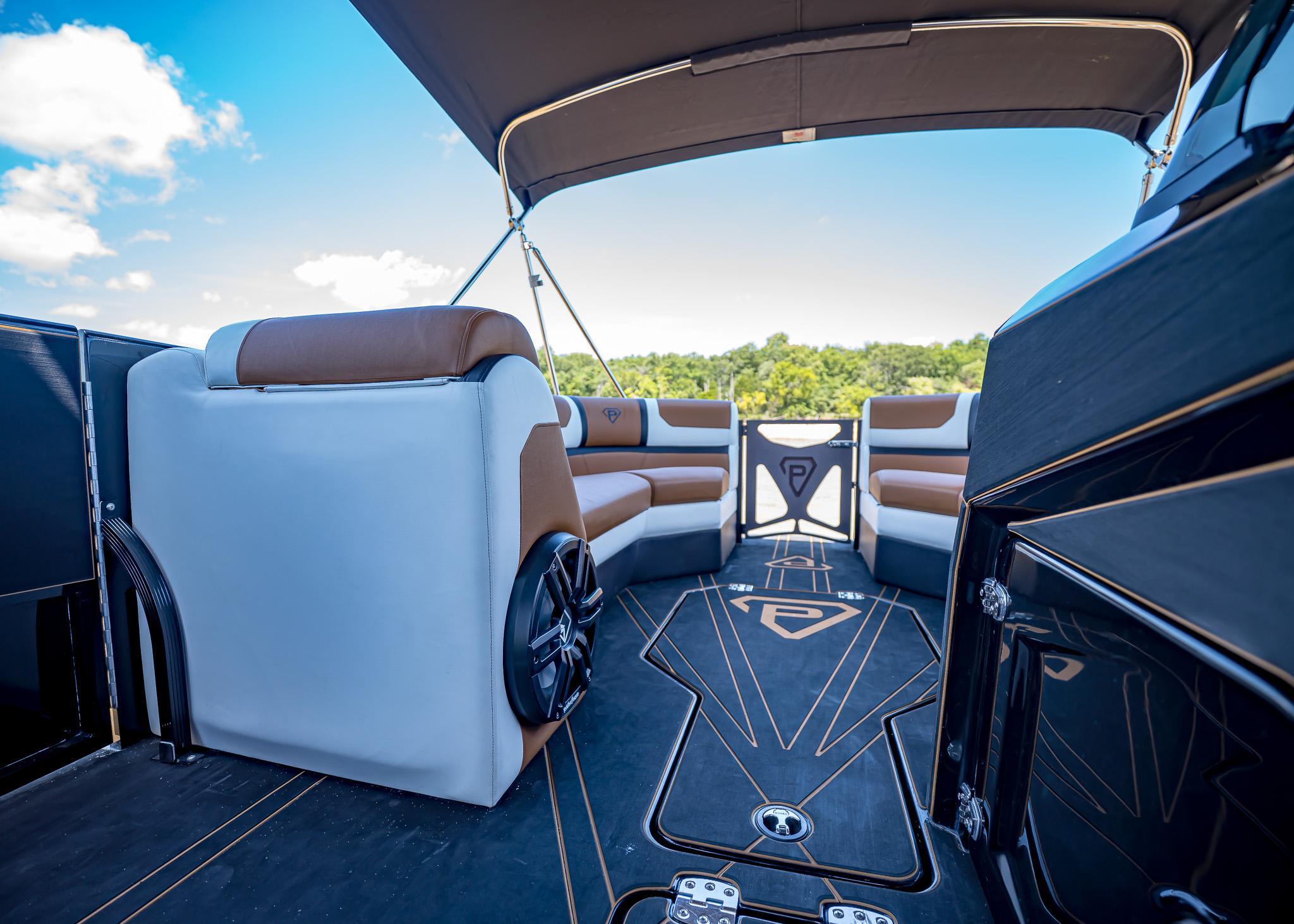 Luxurious interior of 2025 Paradigm 236 boat with stylish seating and modern design.