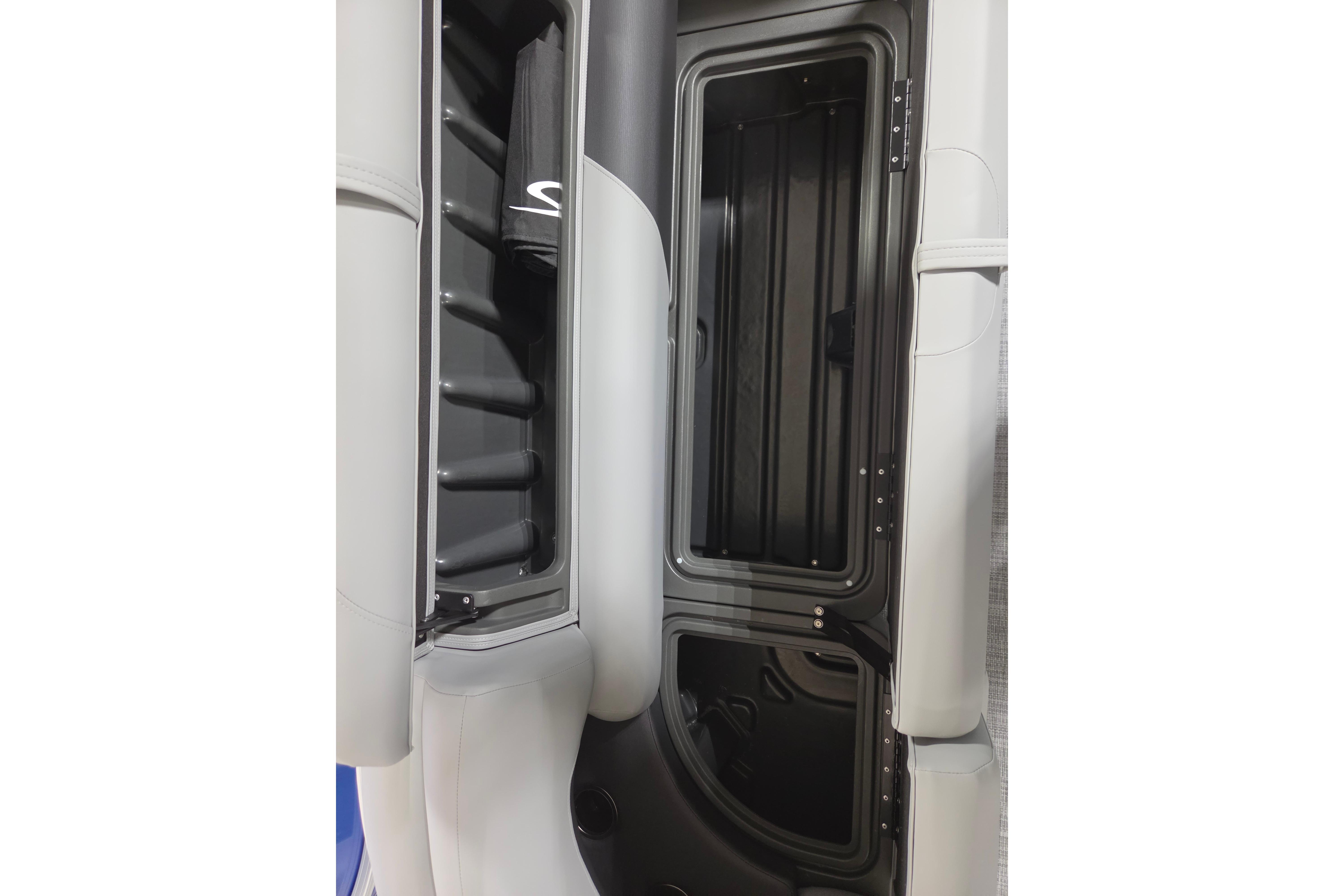 2026 Sun Tracker Party Barge 20 DLX interior storage compartments, featuring sleek design and ample space.