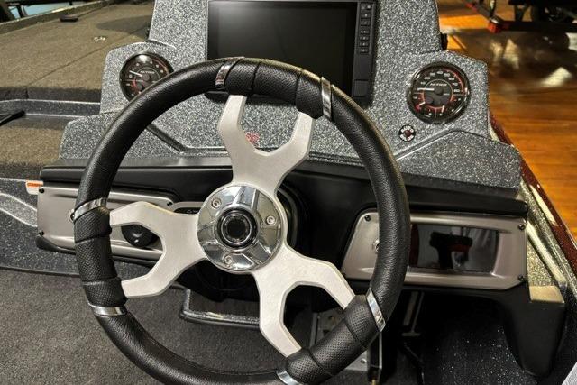 Steering wheel and dashboard of 2026 Nitro Z20 XL Pro boat, featuring modern controls and gauges.