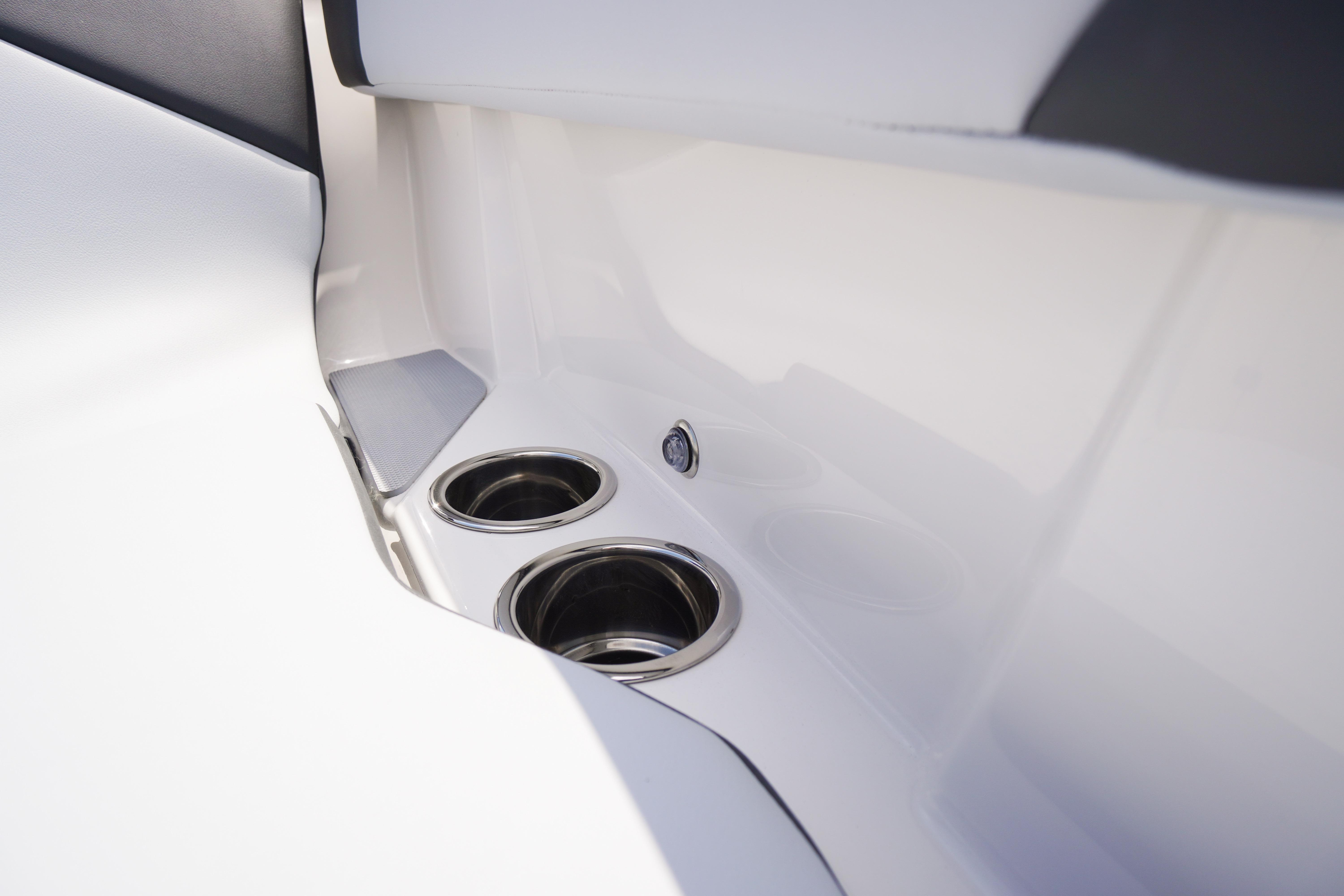 2026 Chaparral SSX 4 boat interior with stainless steel cup holders.