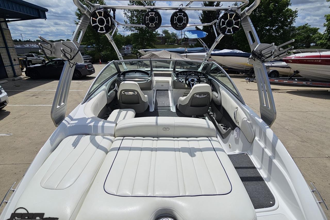 2010 Cobalt 232 WSS boat interior with sleek seating and advanced audio system.