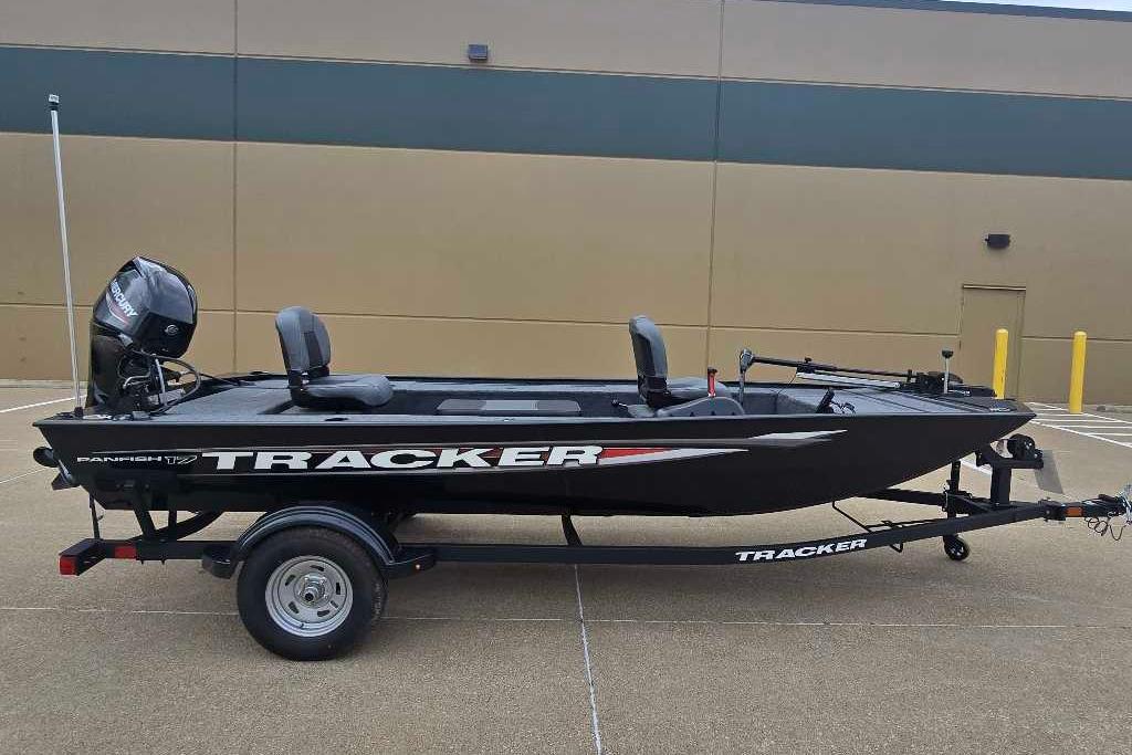2026 Tracker Panfish 17 boat on trailer, parked outdoors.