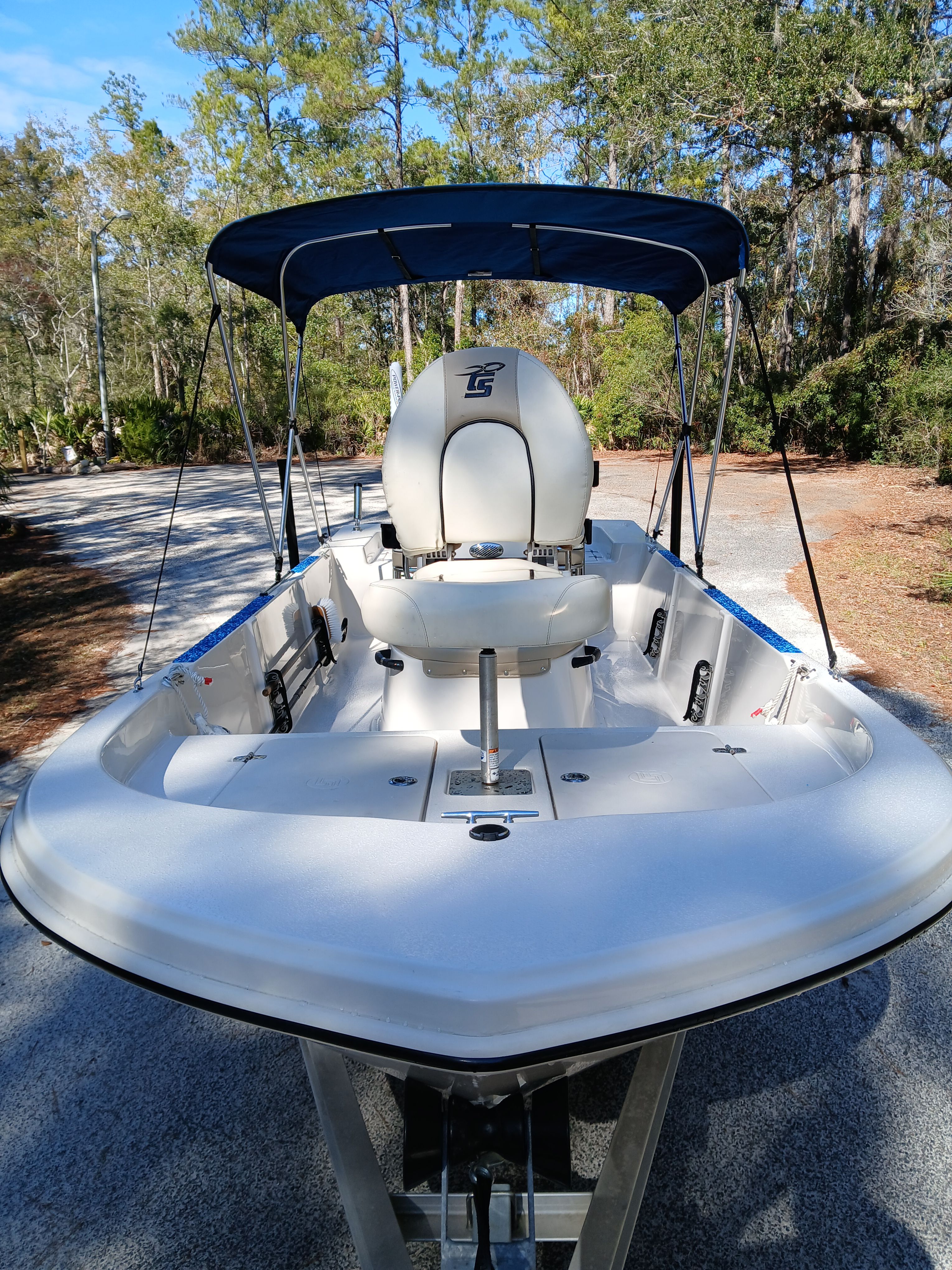 2023 Carolina Skiff 192 JLS boat with canopy on trailer.
