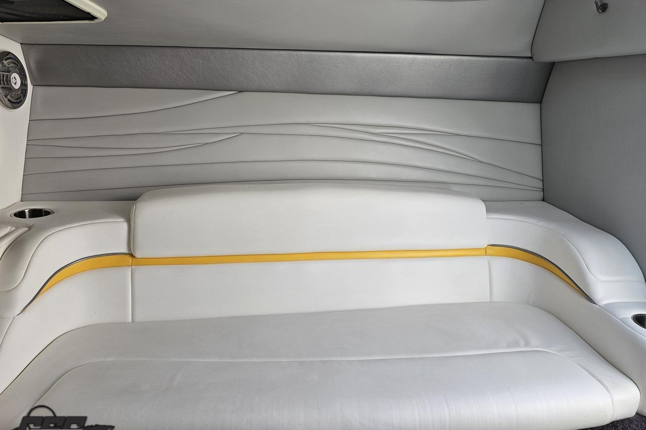 2014 Formula 292 FASTech boat interior with white and yellow seating.
