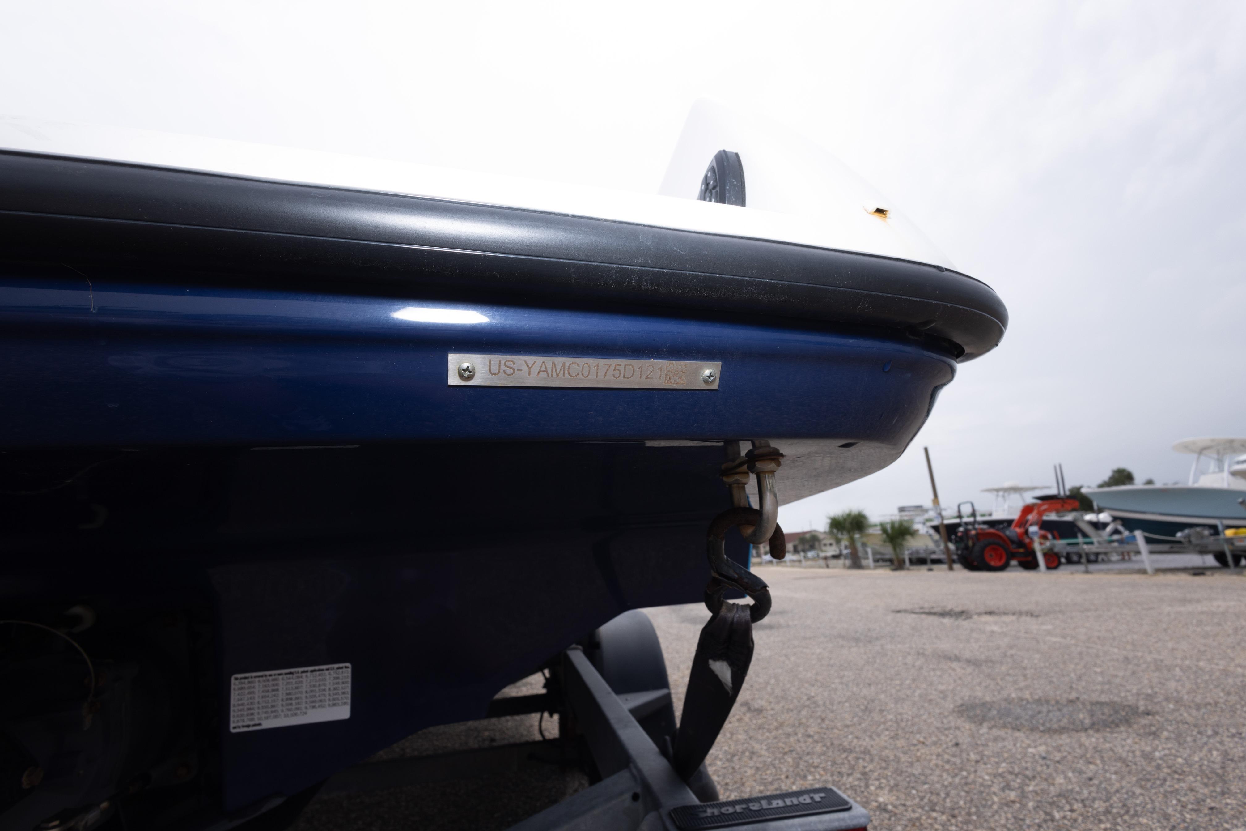 2021 Yamaha Boats AR250 hull with visible identification plate and trailer attachment.