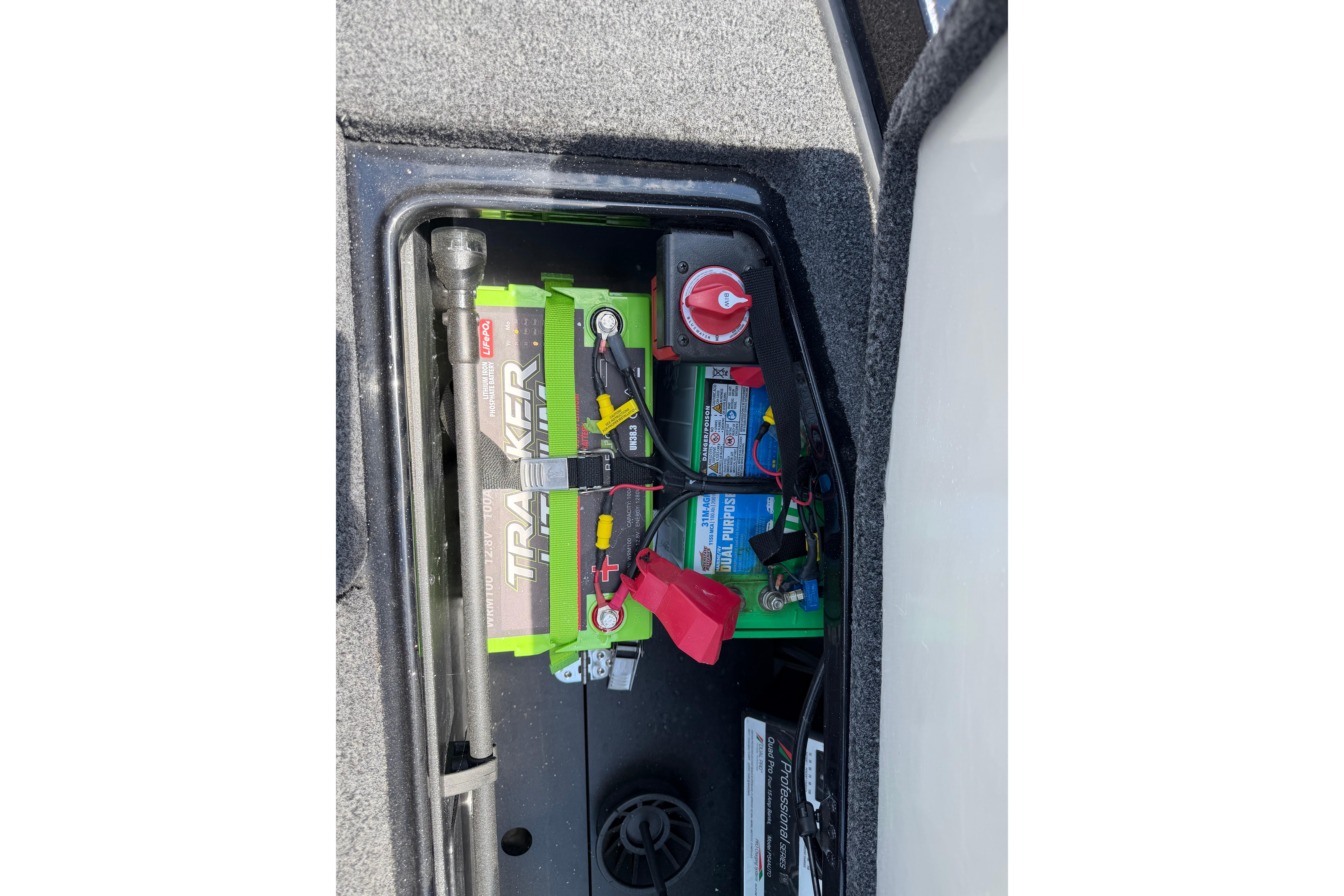 2023 Ranger Z520R boat battery compartment with Tracker battery and wiring.
