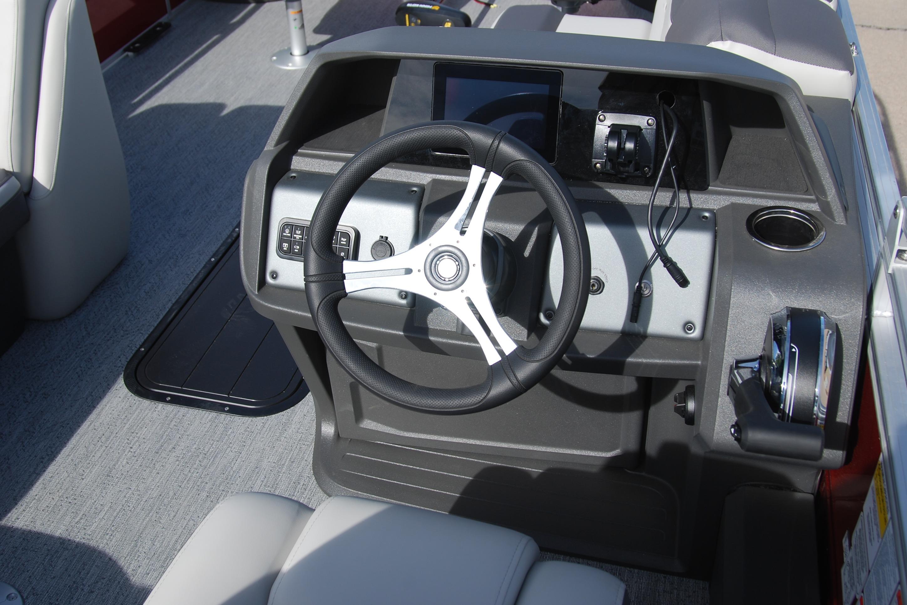 Steering console of 2026 Sun Tracker Fishin' Barge 22 XP3 pontoon boat.