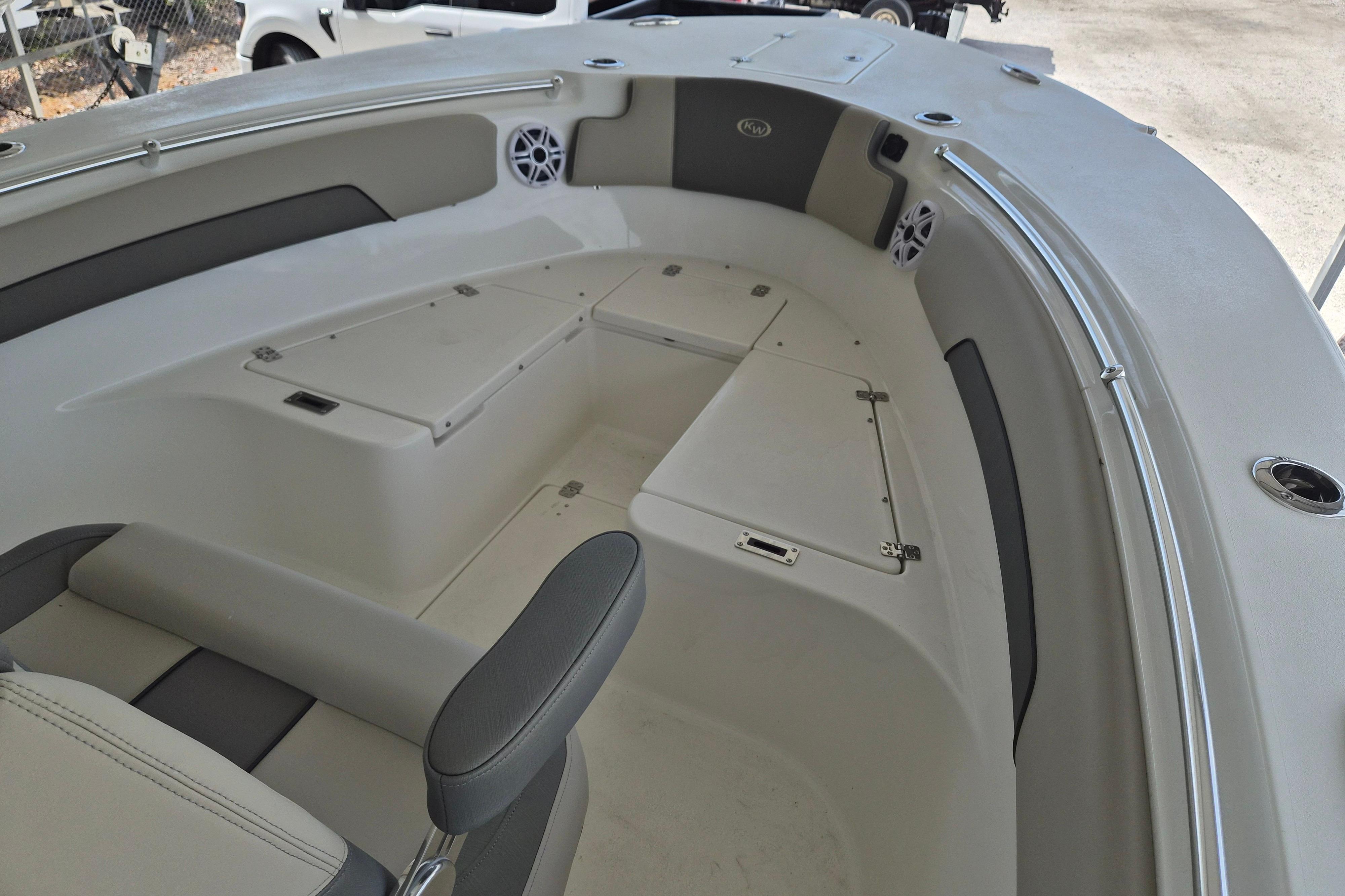 2026 Key West 260 Center Console boat interior with seating and storage compartments.