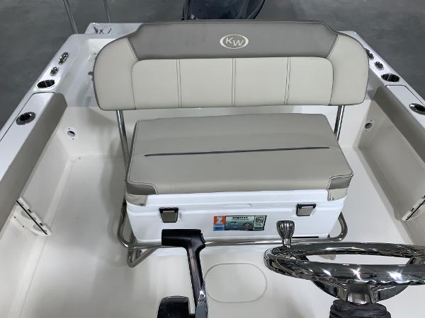 2024 Key West 188 Bay Reef boat interior with cushioned seating and steering wheel.