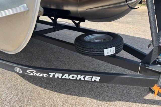 Trailer of 2026 Sun Tracker Party Barge 20 DLX with spare tire.