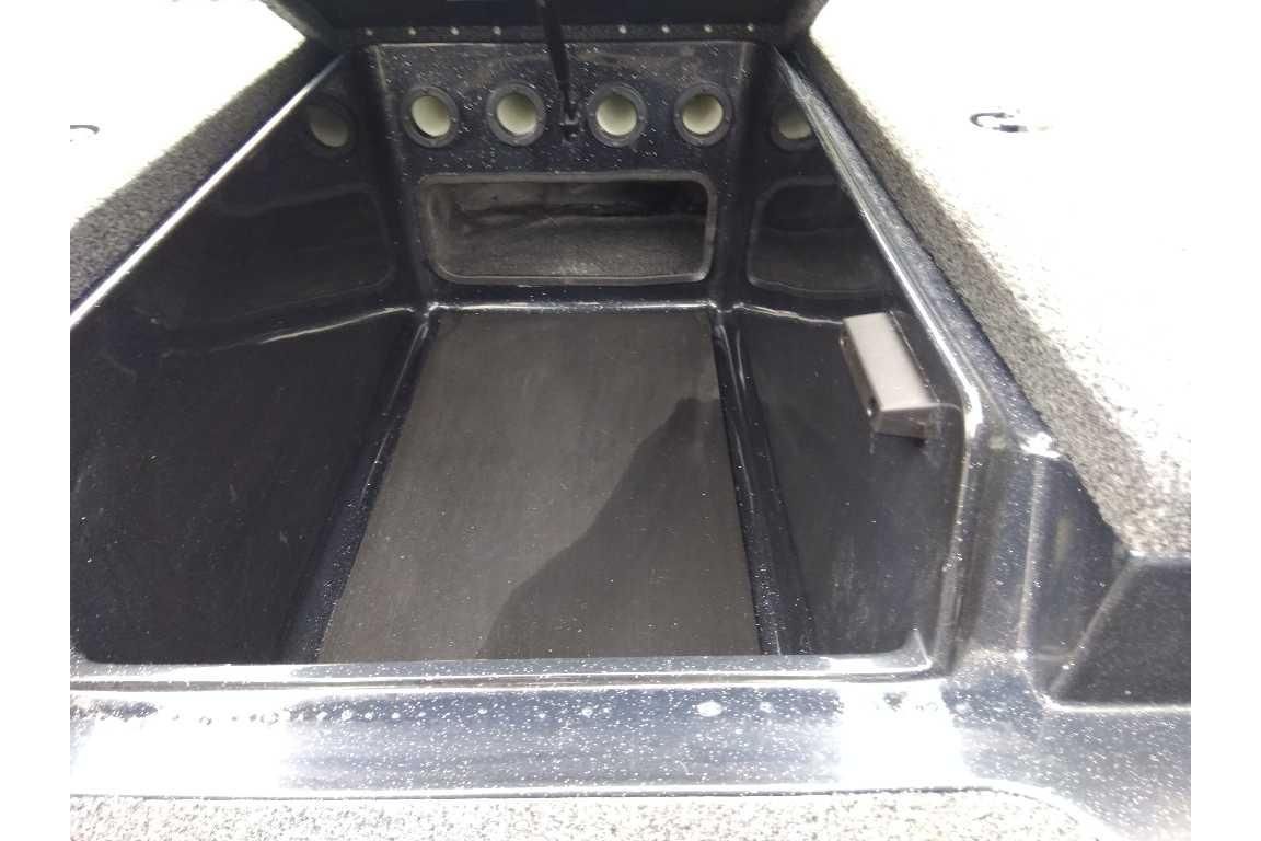 Spacious storage compartment in 2026 Nitro Z17 boat, featuring durable black interior.