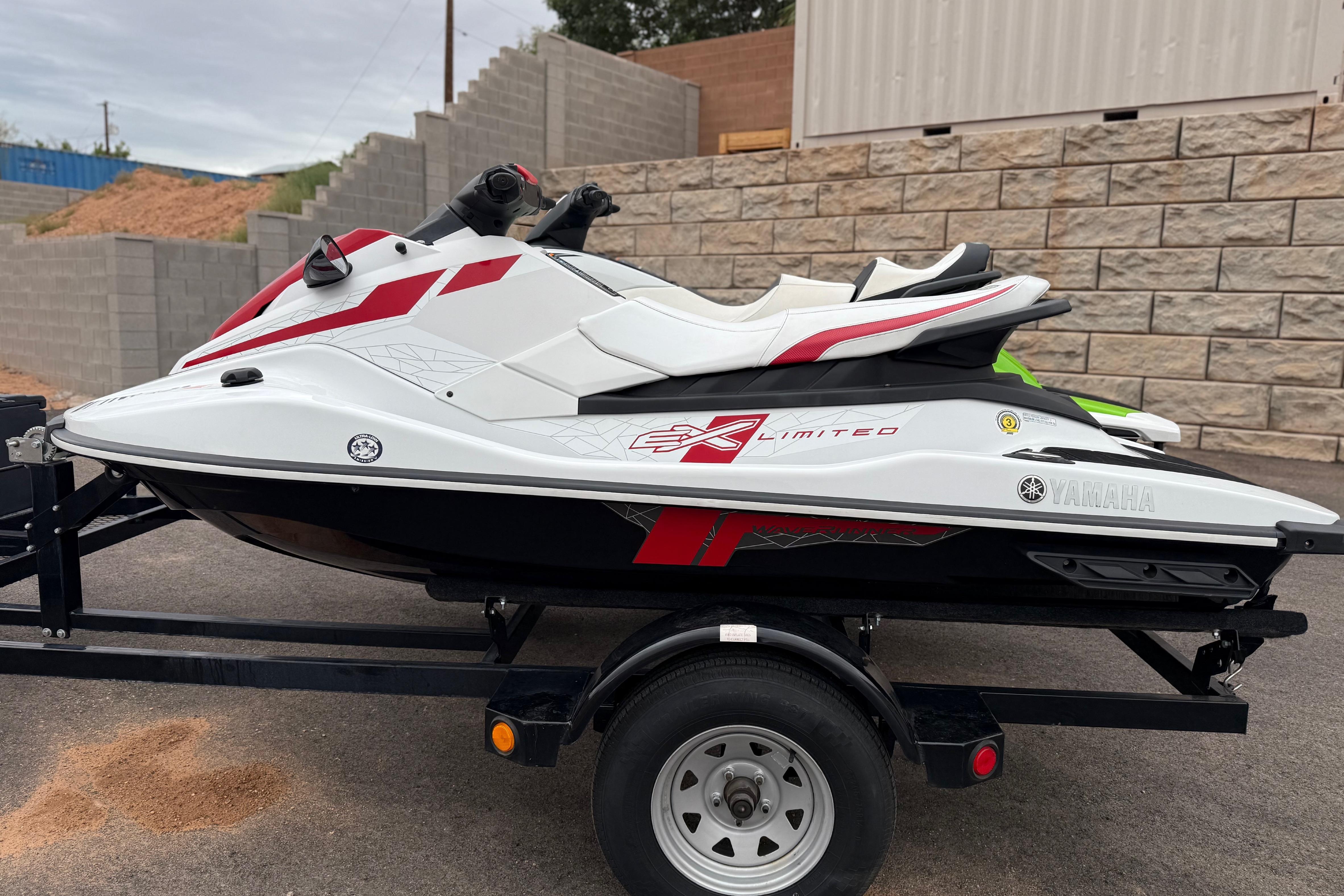 2021 Yamaha WaveRunner EX Limited on trailer, featuring sleek white and red design.