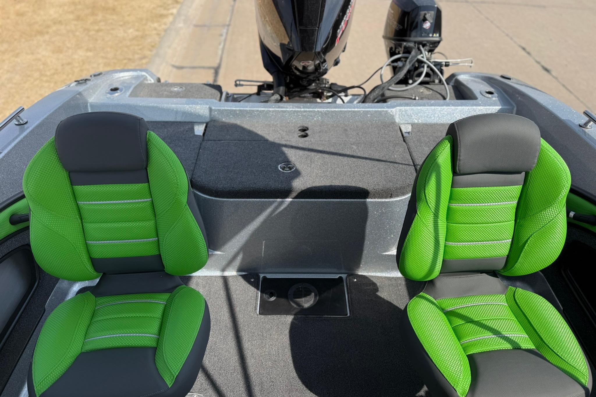 2026 Ranger 1880MS boat interior with vibrant green seats and modern design.